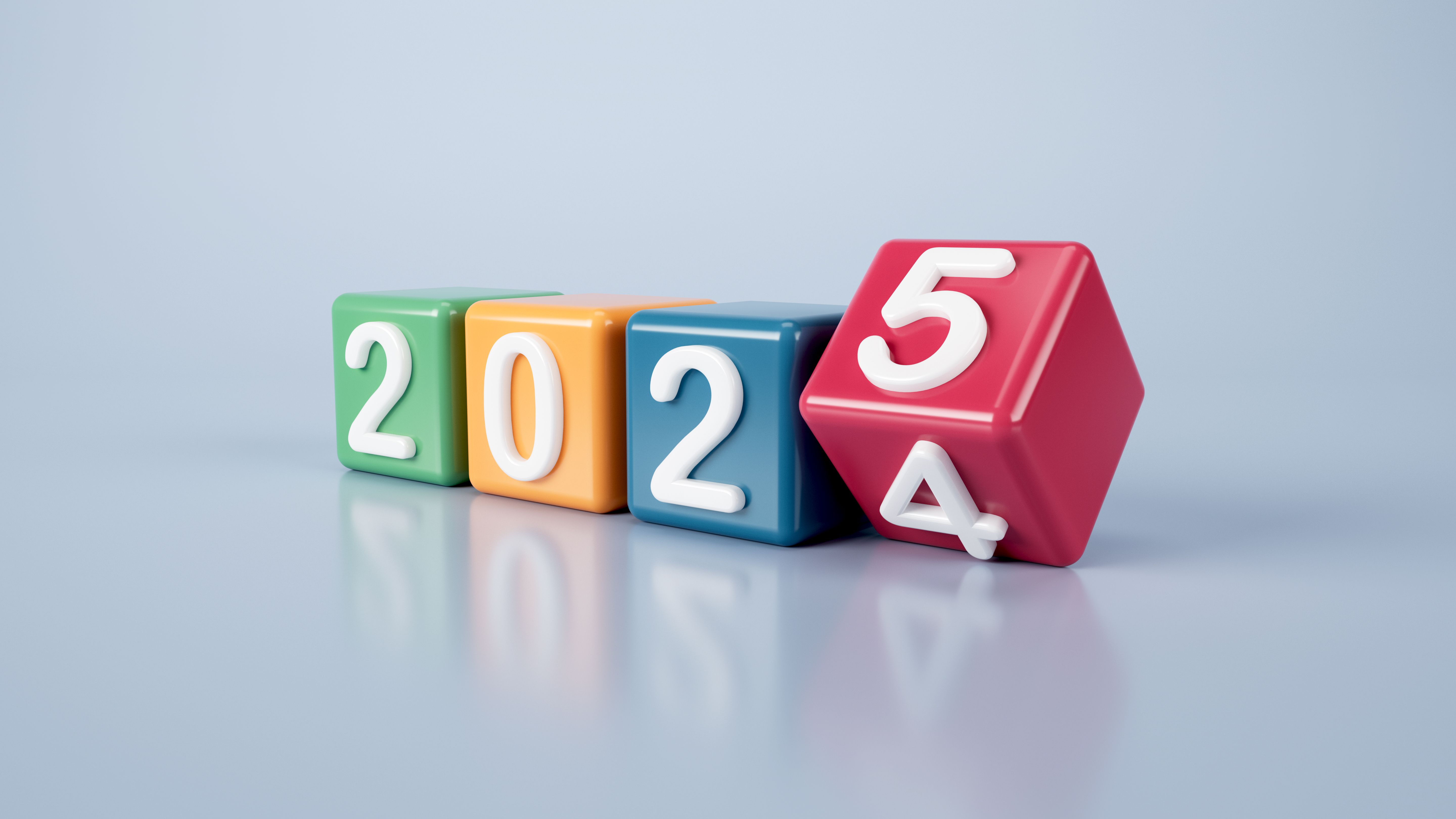 Colorful Cubes Changing From 2024 To 2025 Over Grey Background