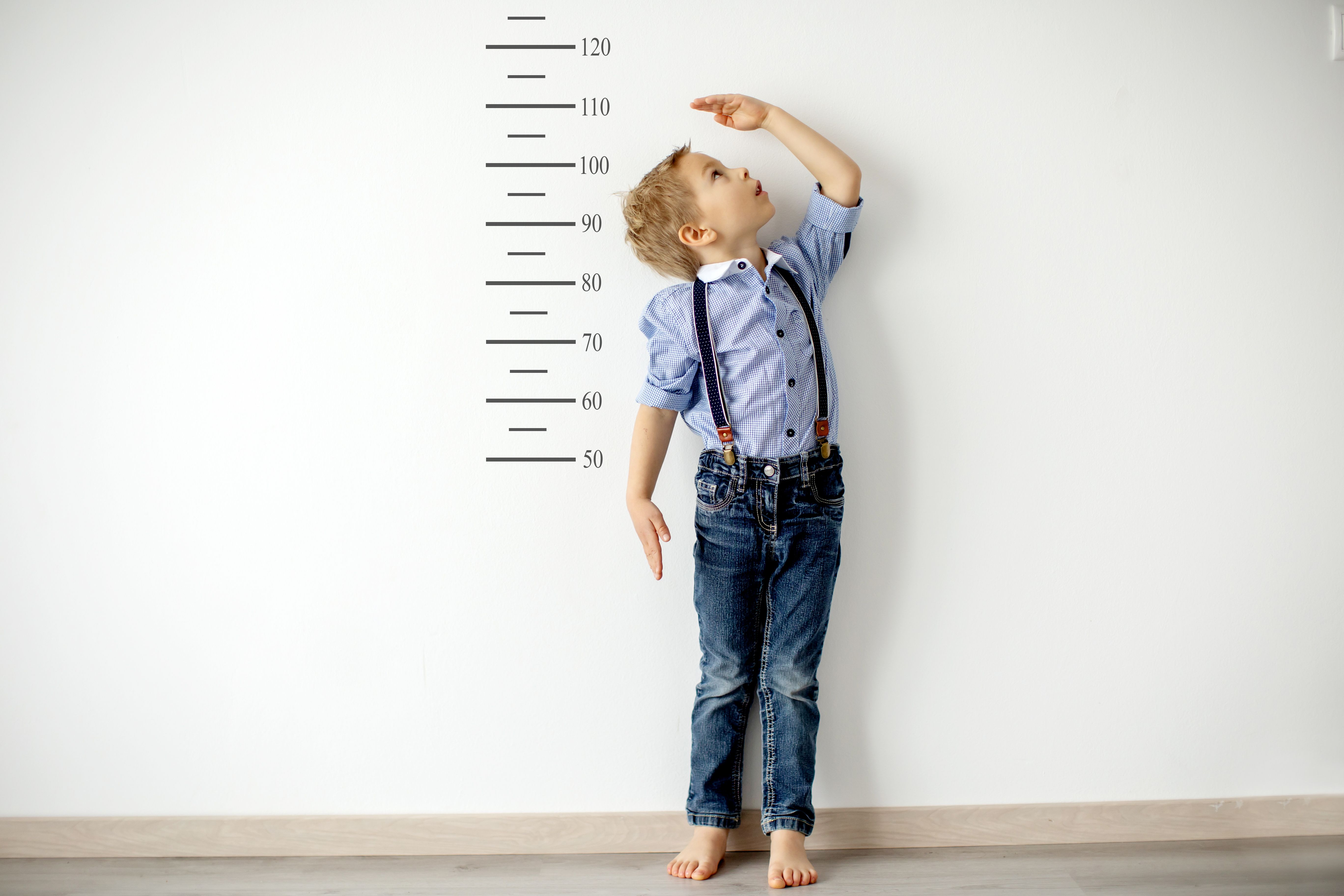 child measuring