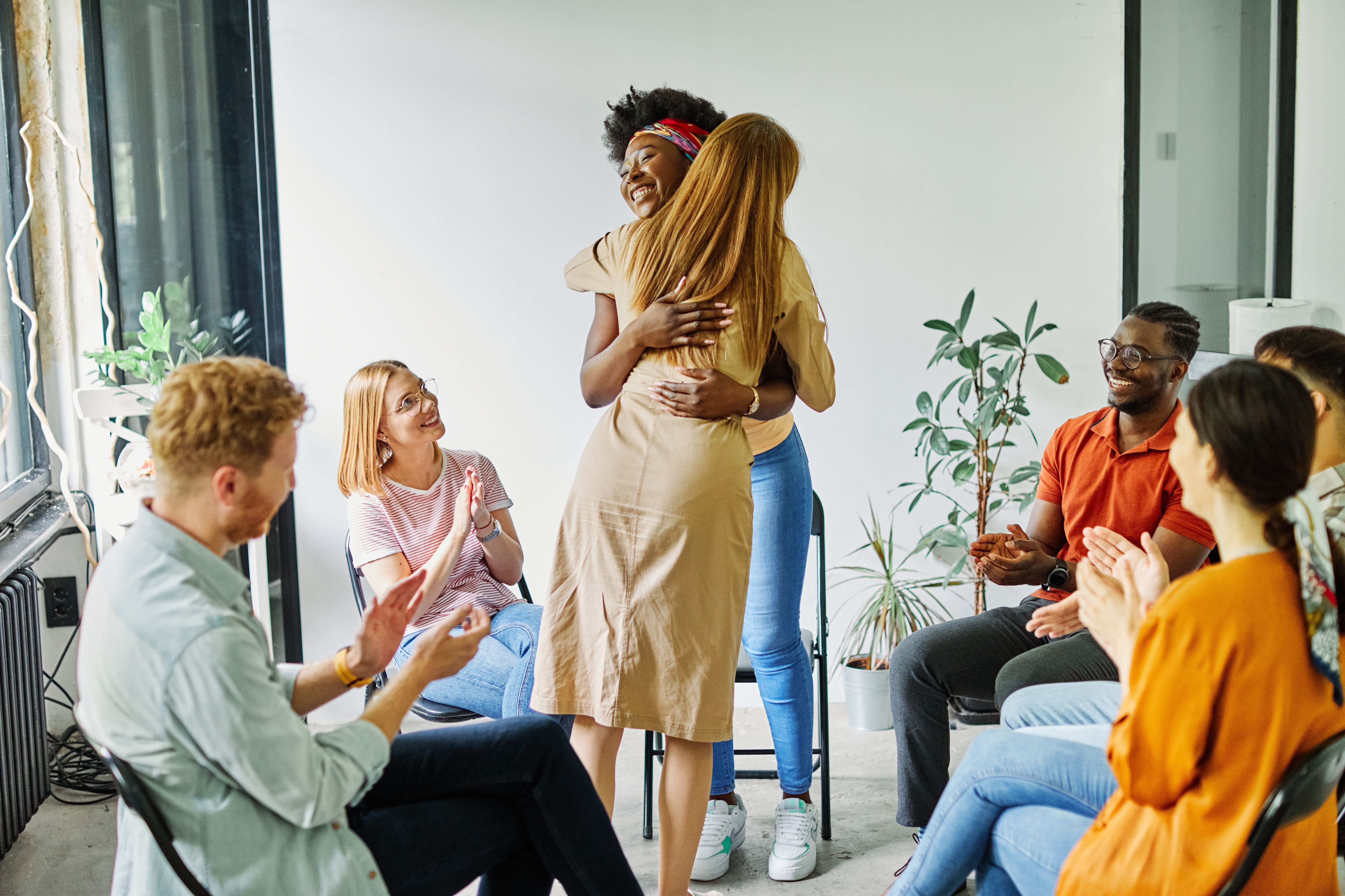 psychotherapy meeting woman support group mantherapy psychology patient psychologist  communication help circle  advice talking business support hug together care friend togetherness love help happy friendship embracing trust hugging