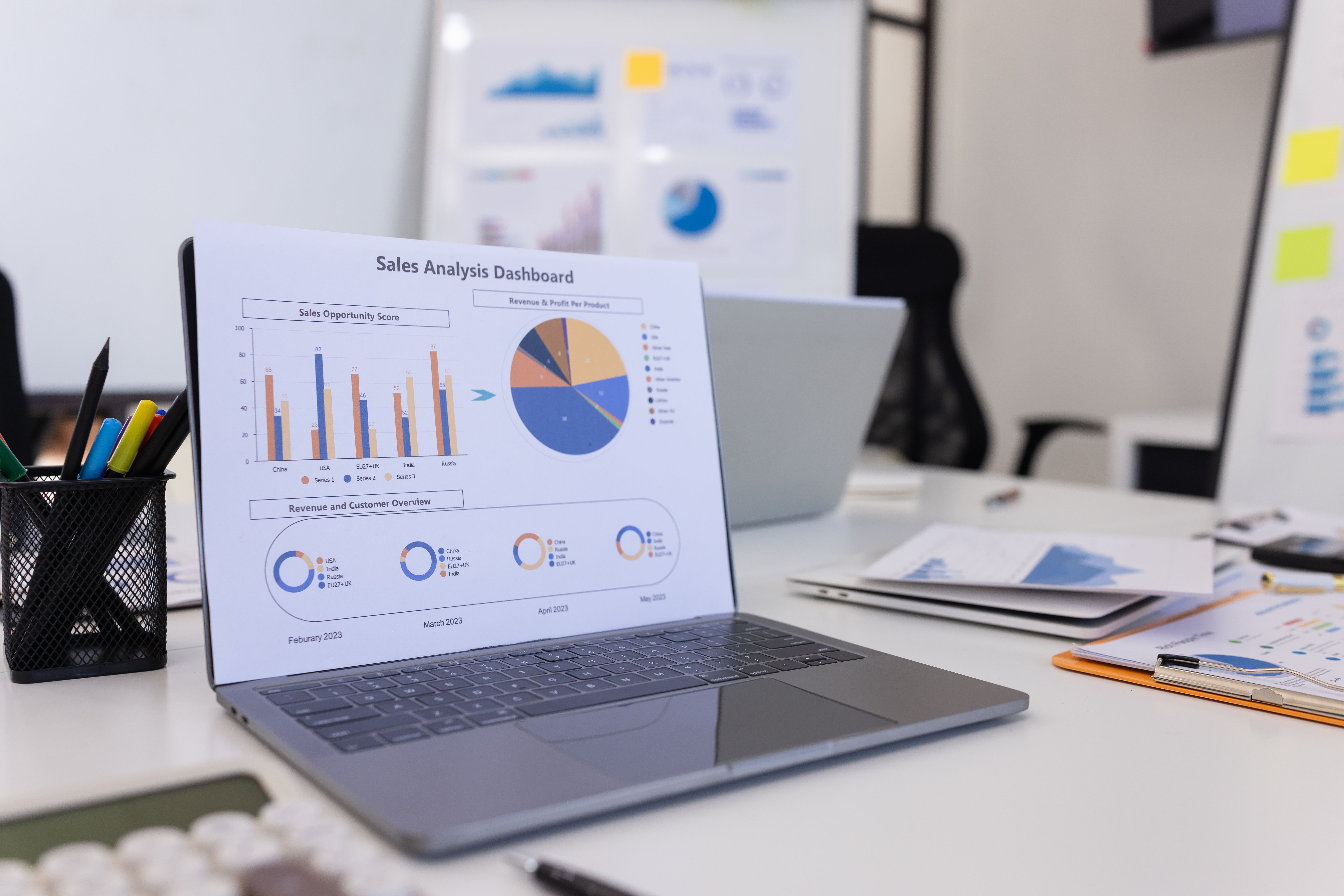 Laptop computer and dashboard analysis and data management a meeting table in office. Laptop computer and dashboard analysis and data management a meeting table in office.