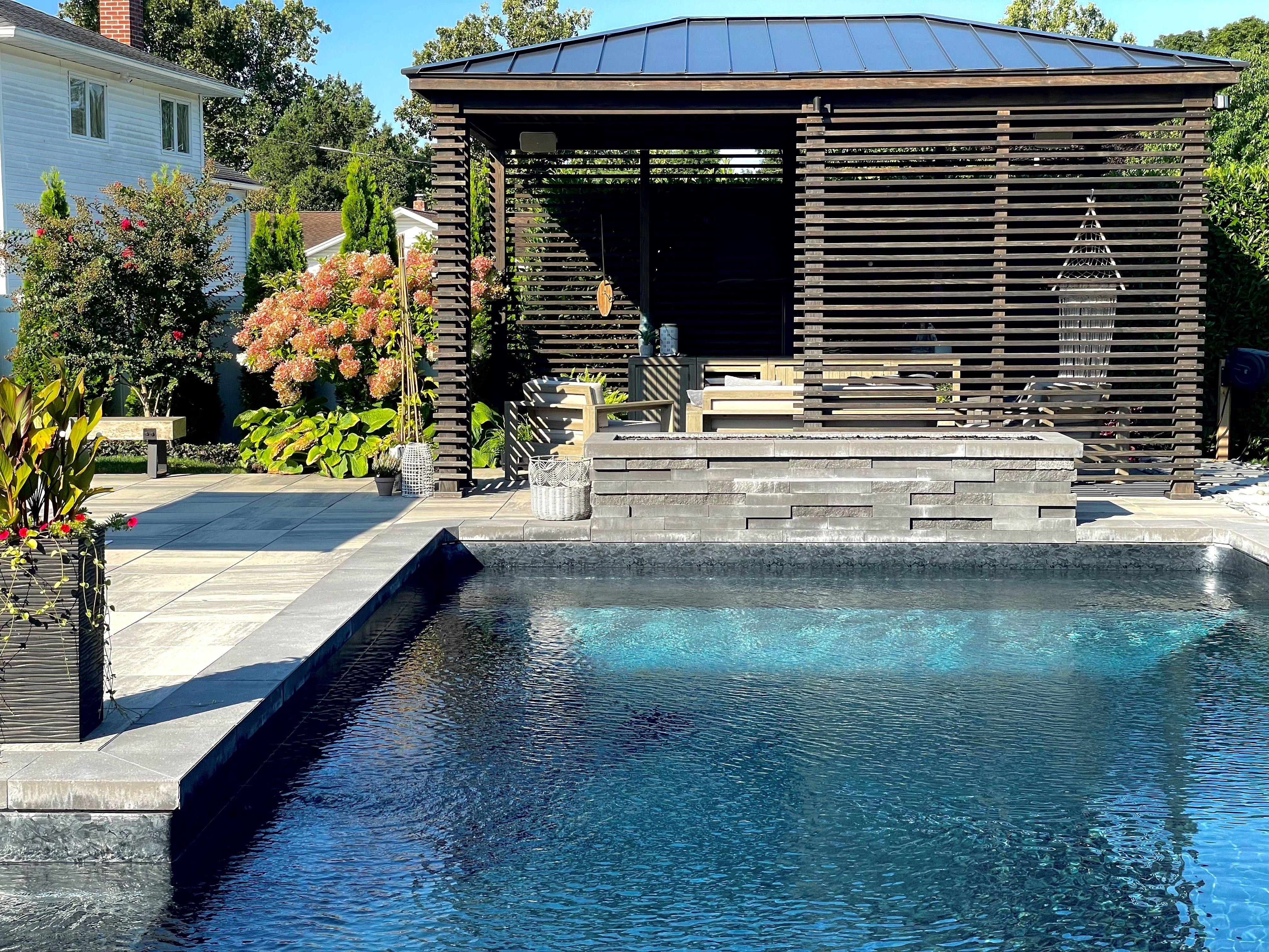 Gorgeous modern backyard, perfect design and aesthetics.  Home outdoor entertainment space has everything you desire.