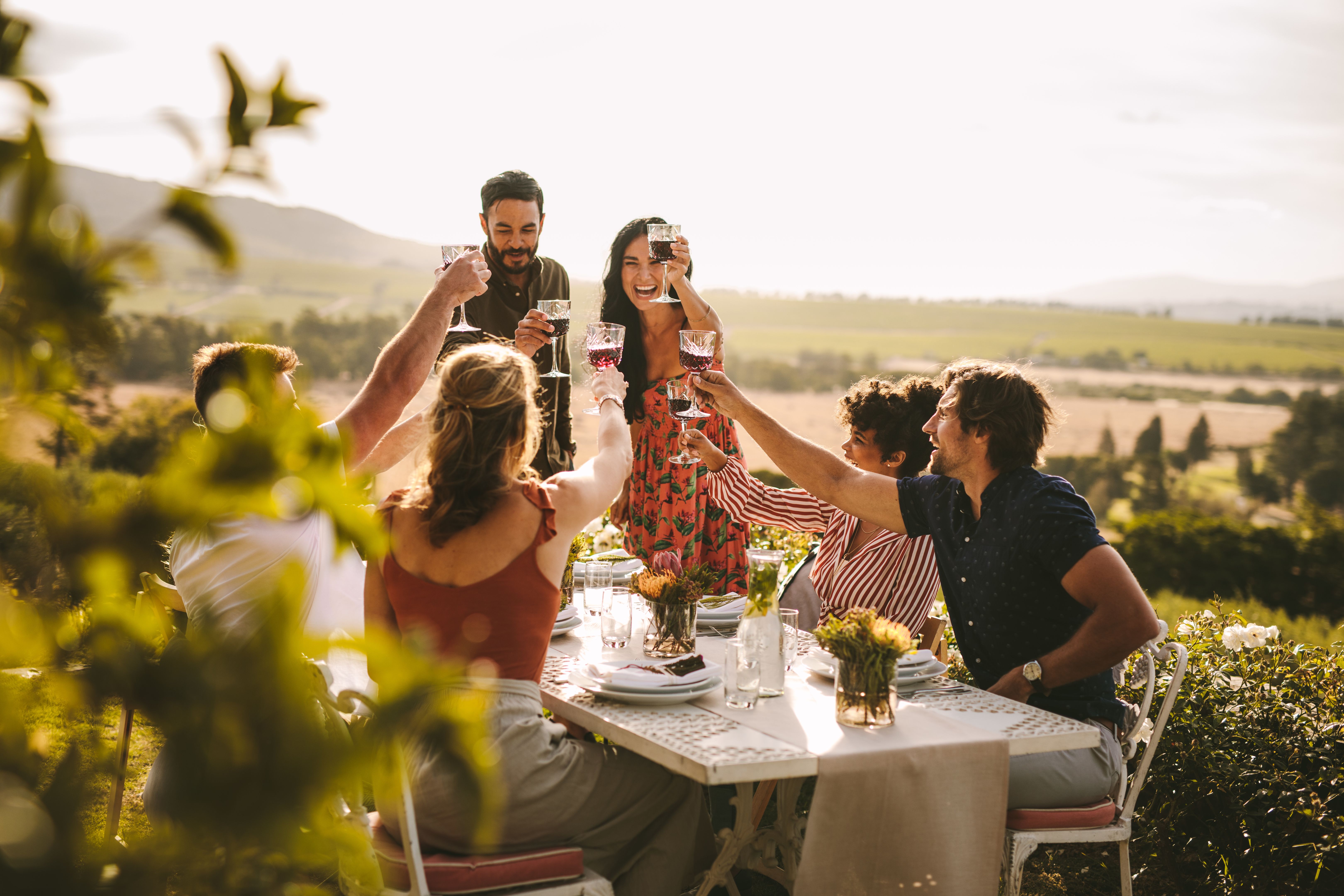 people enjoying wine
