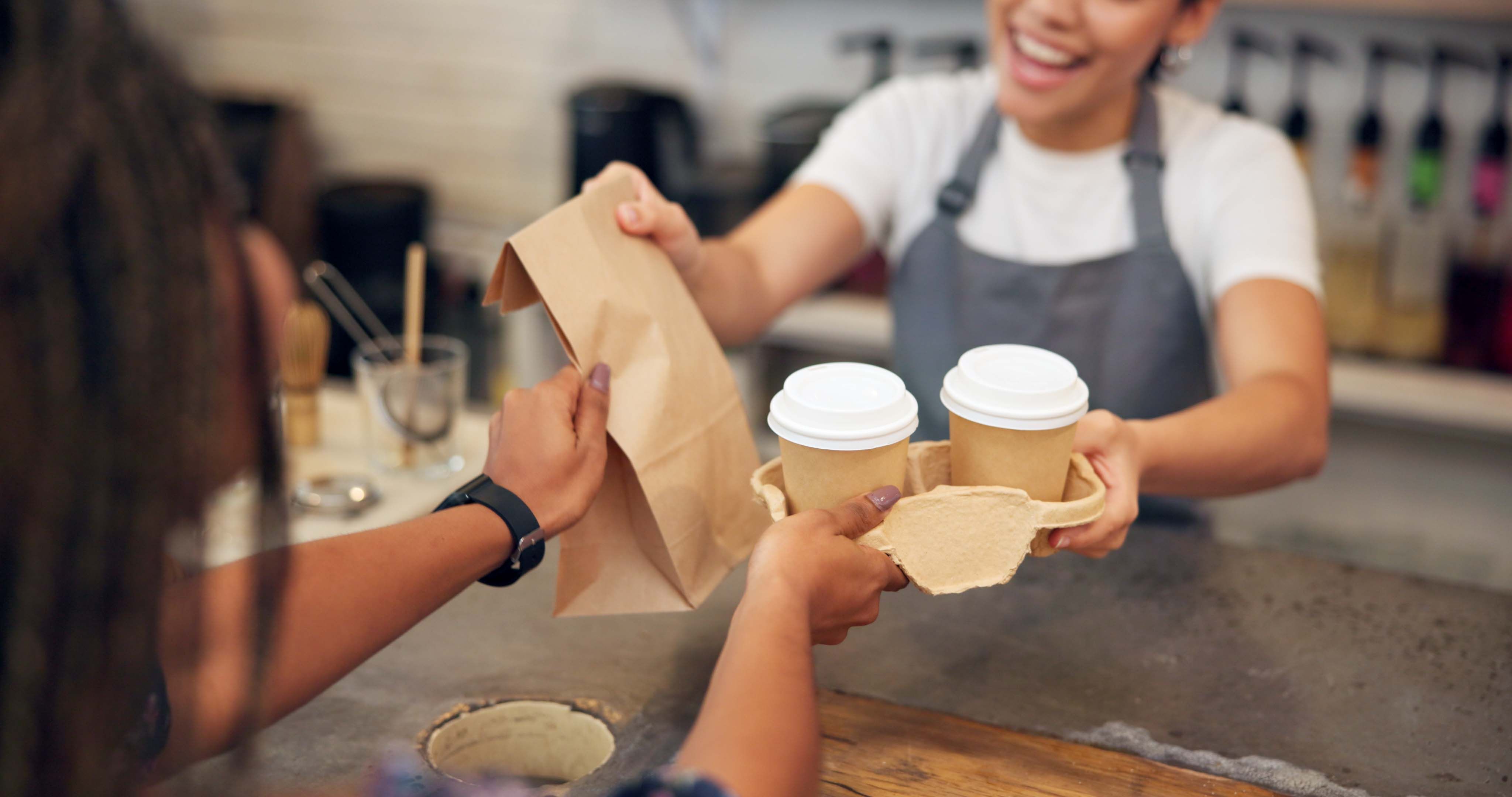 barista serving coffee