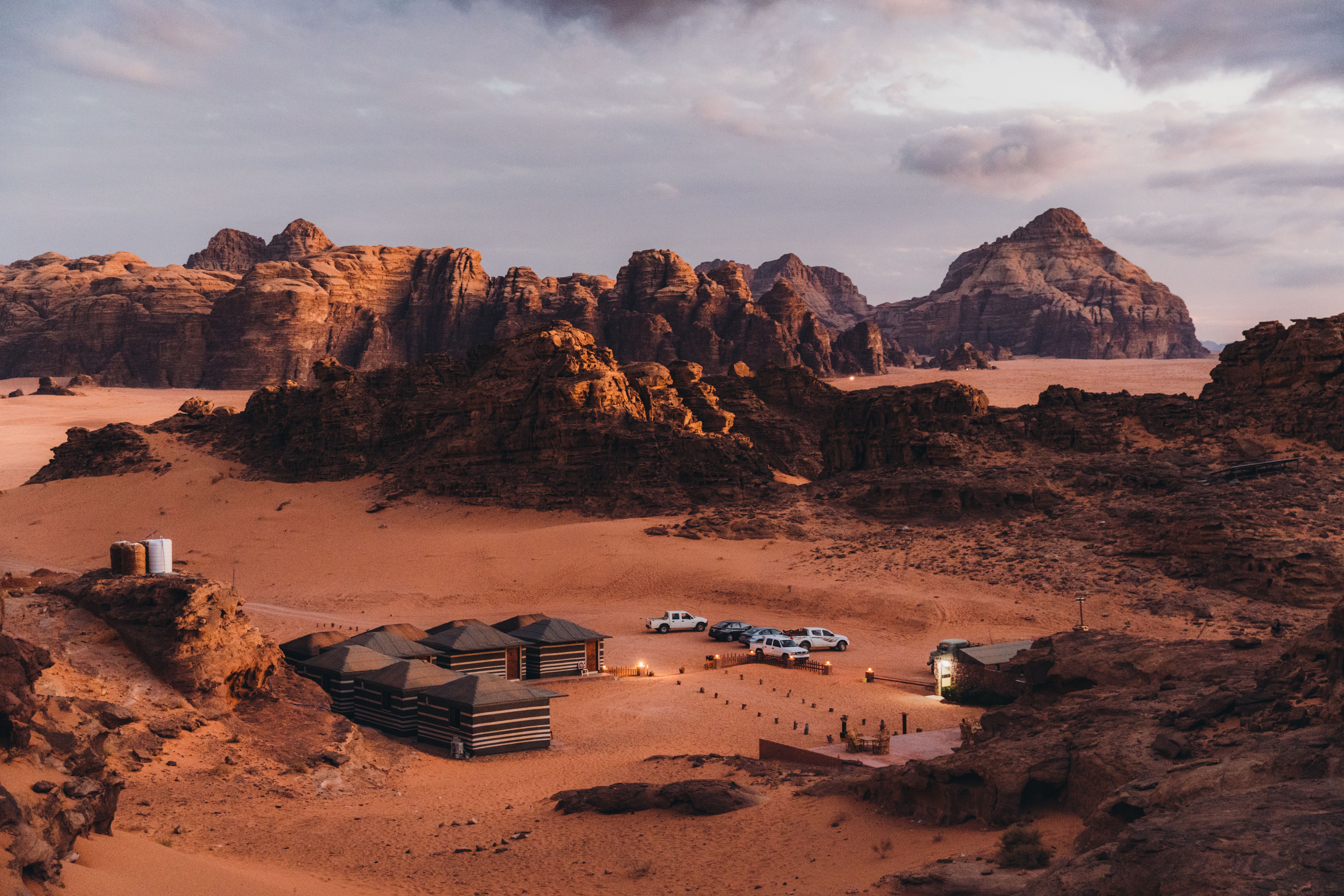 Scenic view of the bedouin camp hidden in the rocks of Wadi Rum desert during twilight