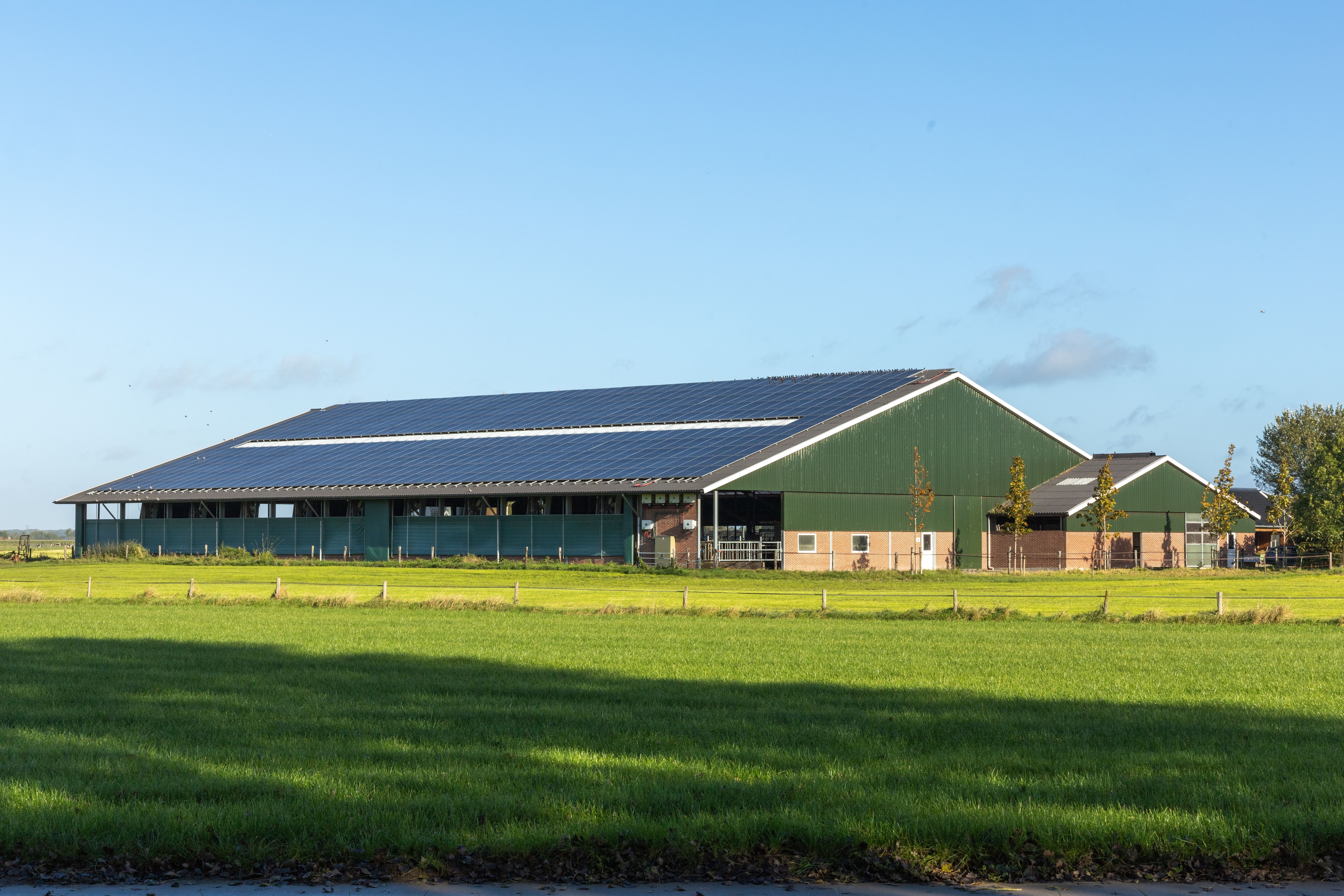 A Dutch farm with  solar panels on the roof