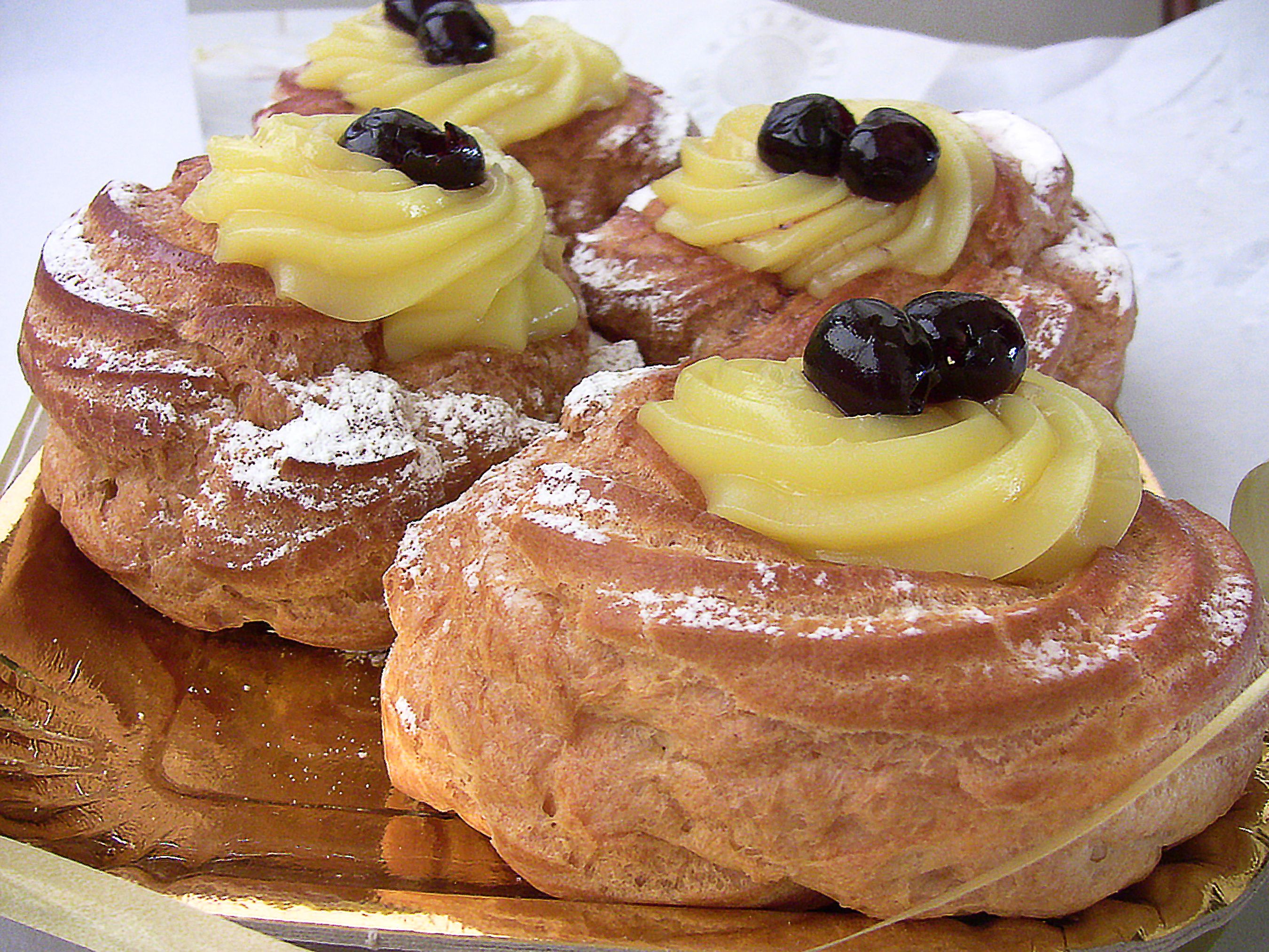 zeppole of Saint Joseph, one after the other zeppole of Saint Joseph, one after the other