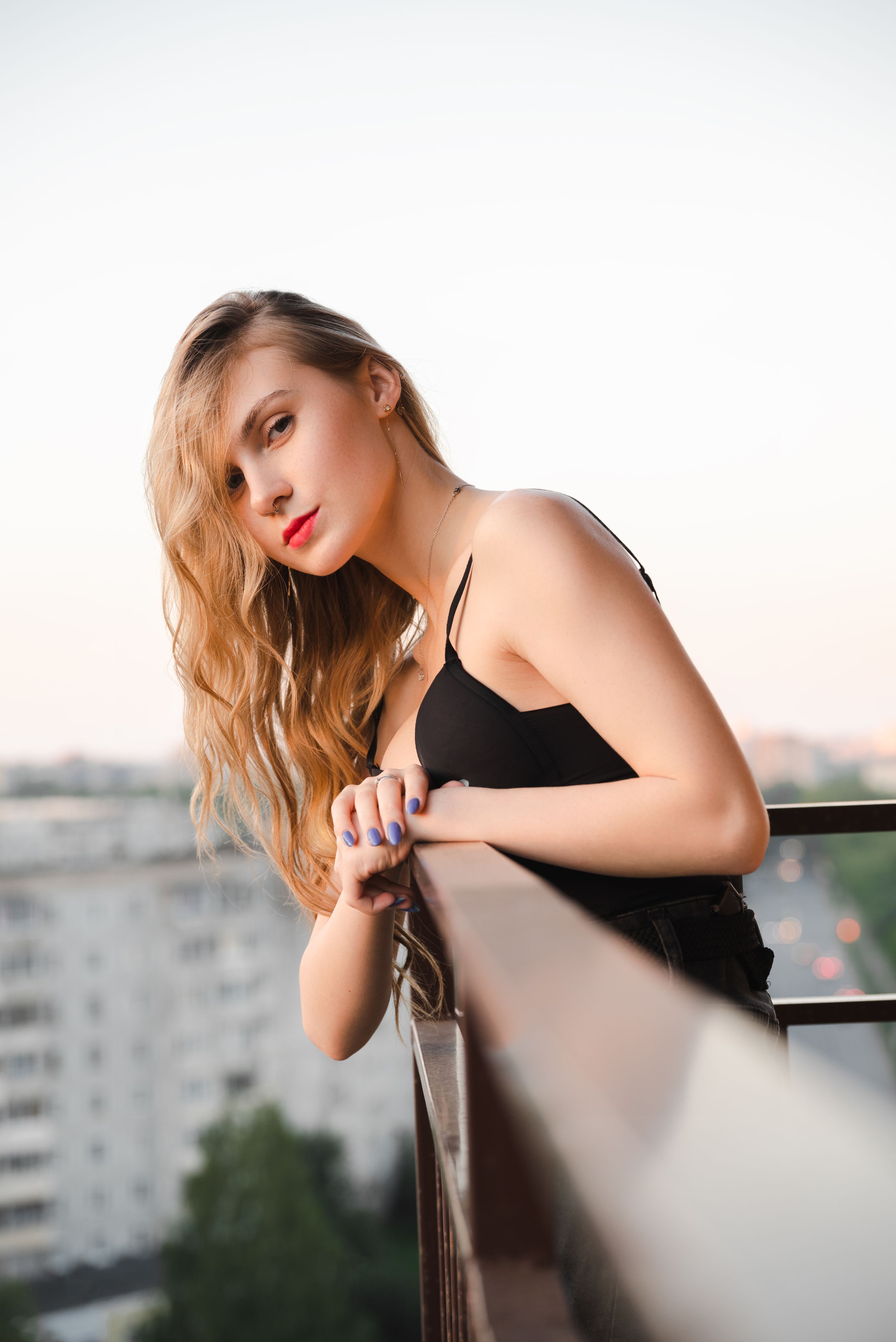 Woman in balcony Woman in balcony
