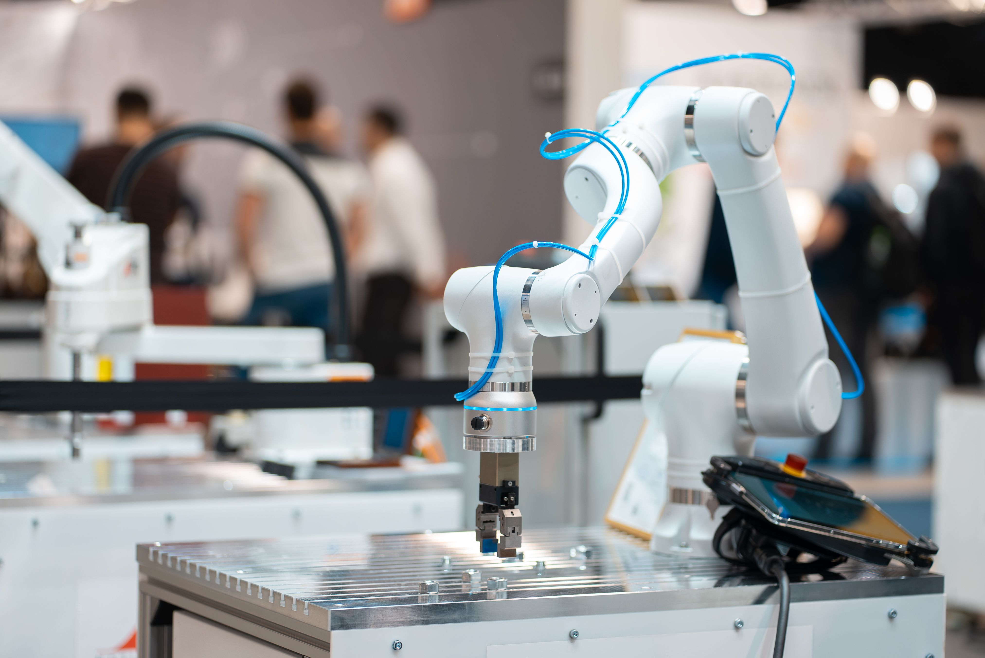 Collaborative robot cell on a workshop bench