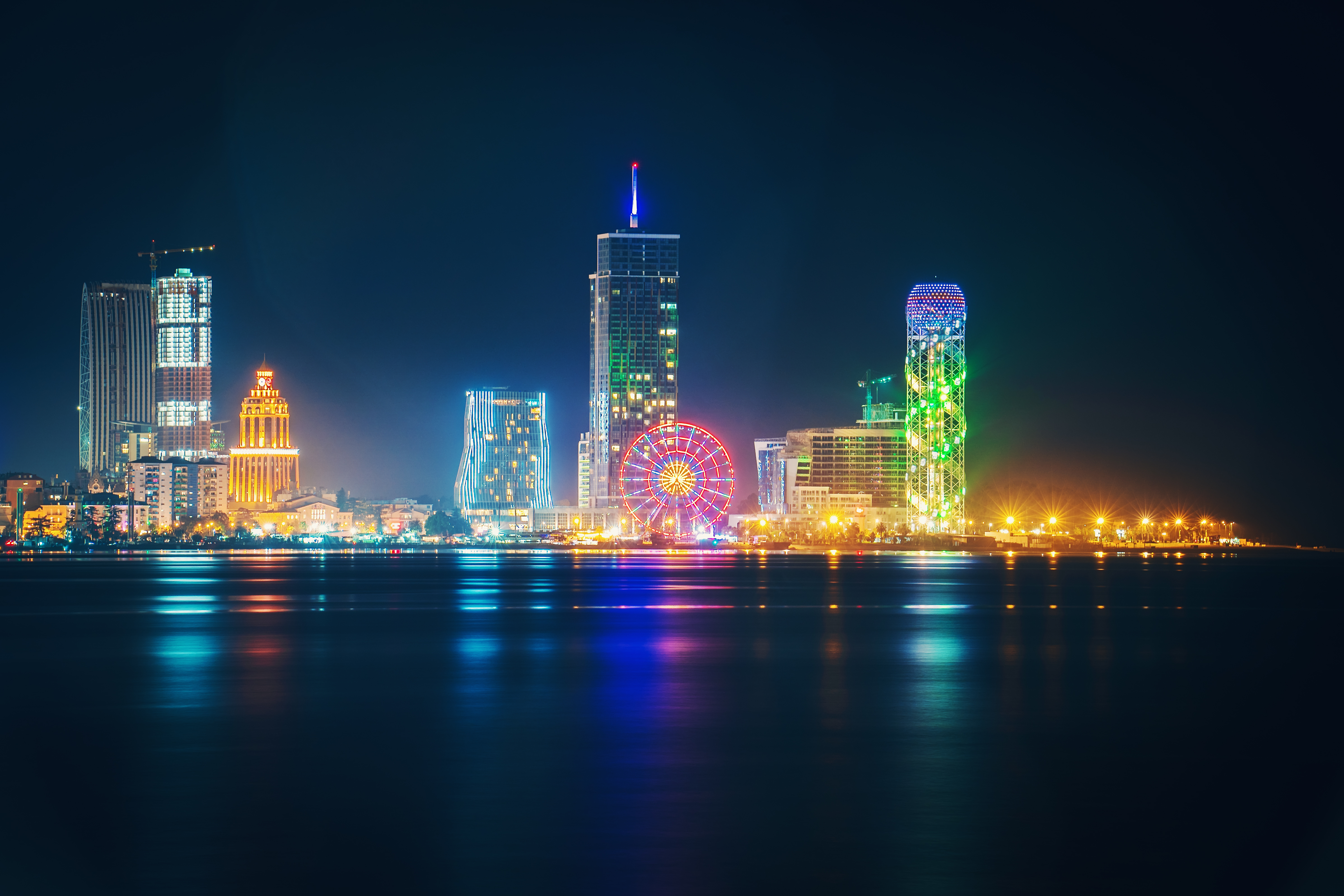 Night view of Batumi, Georgia. Resort city with illuminated buildings Night view of Batumi, Georgia. Resort city with illuminated buildings