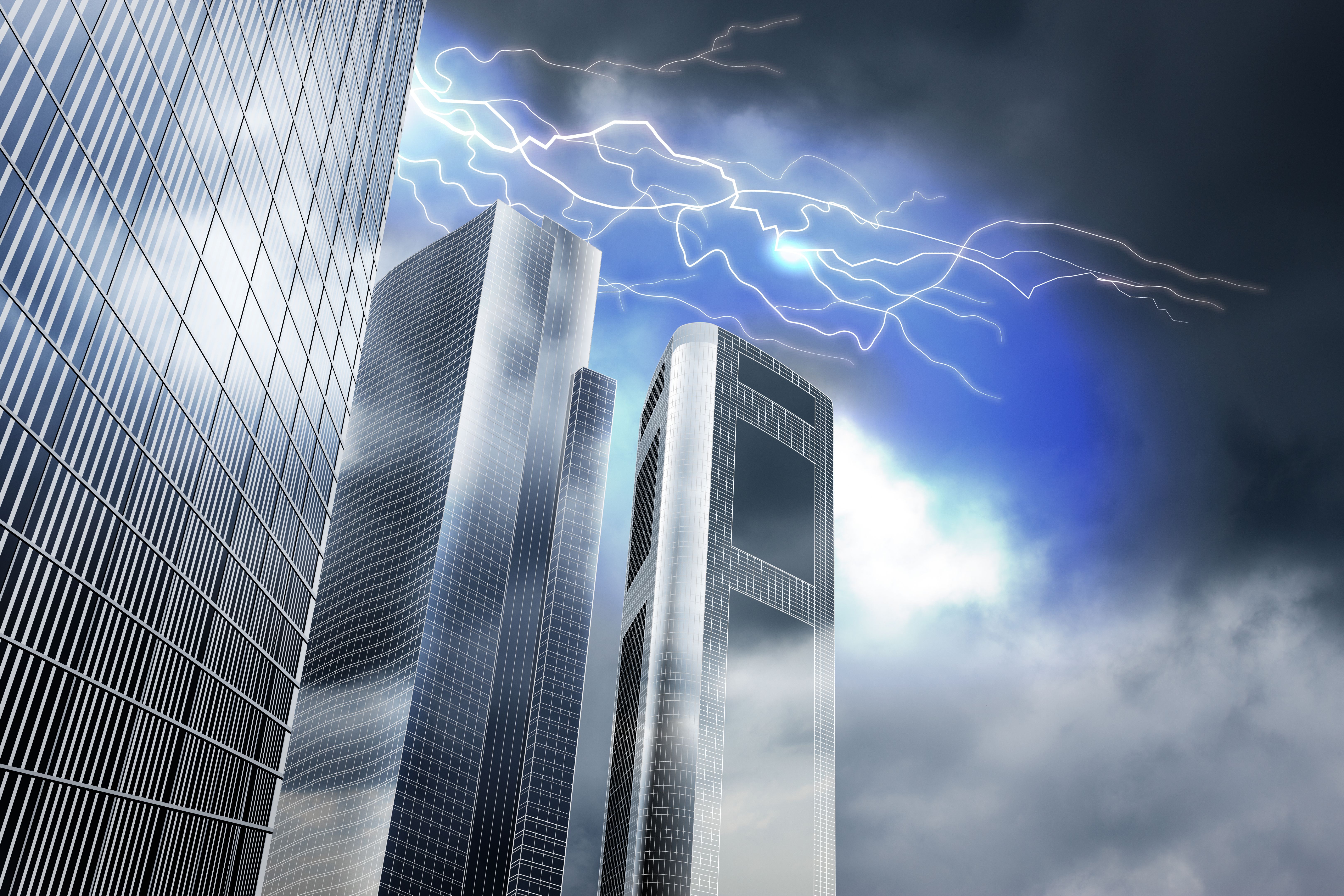 Urban image of high-rise office building and abnormal weather with lightning