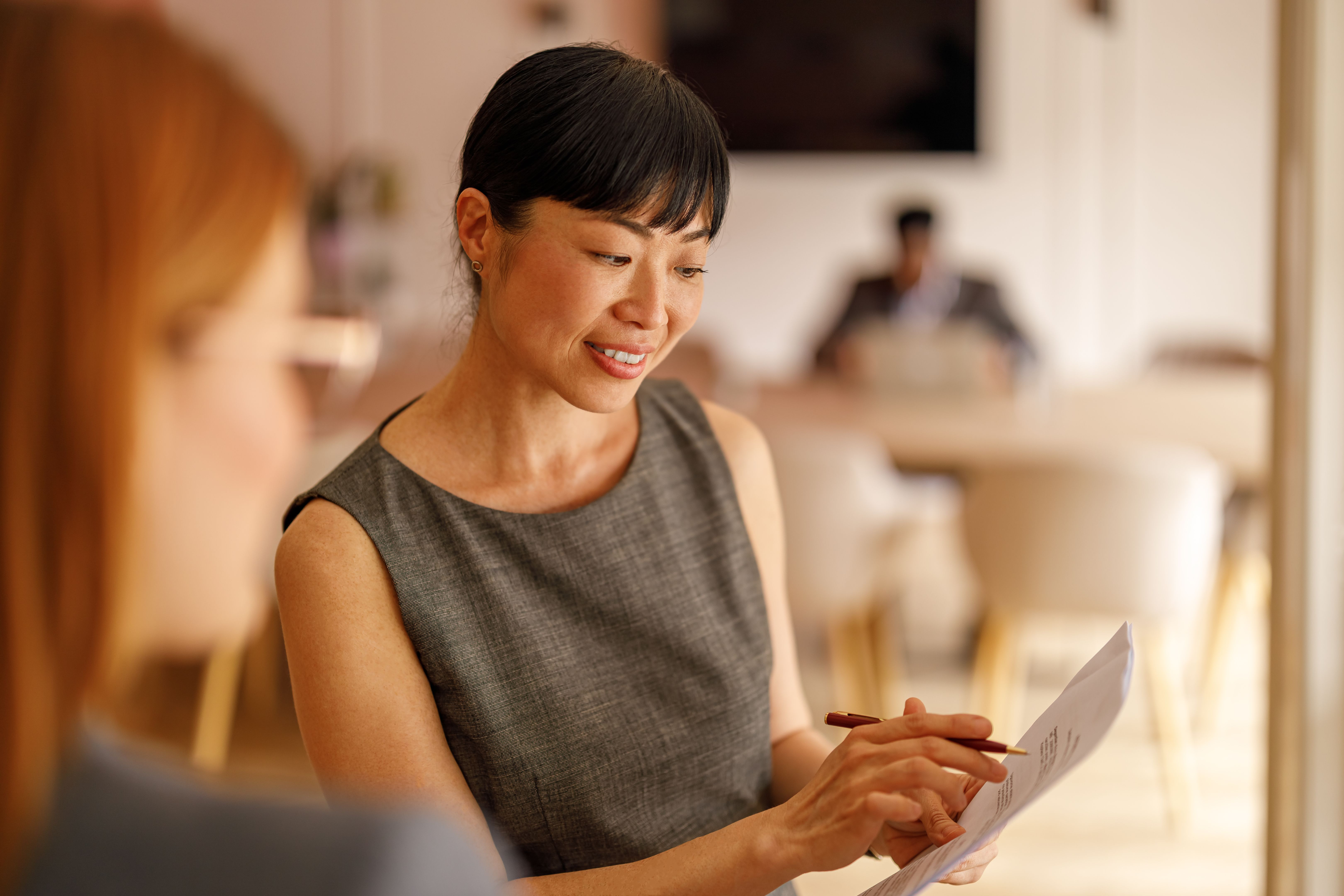 people reviewing documents