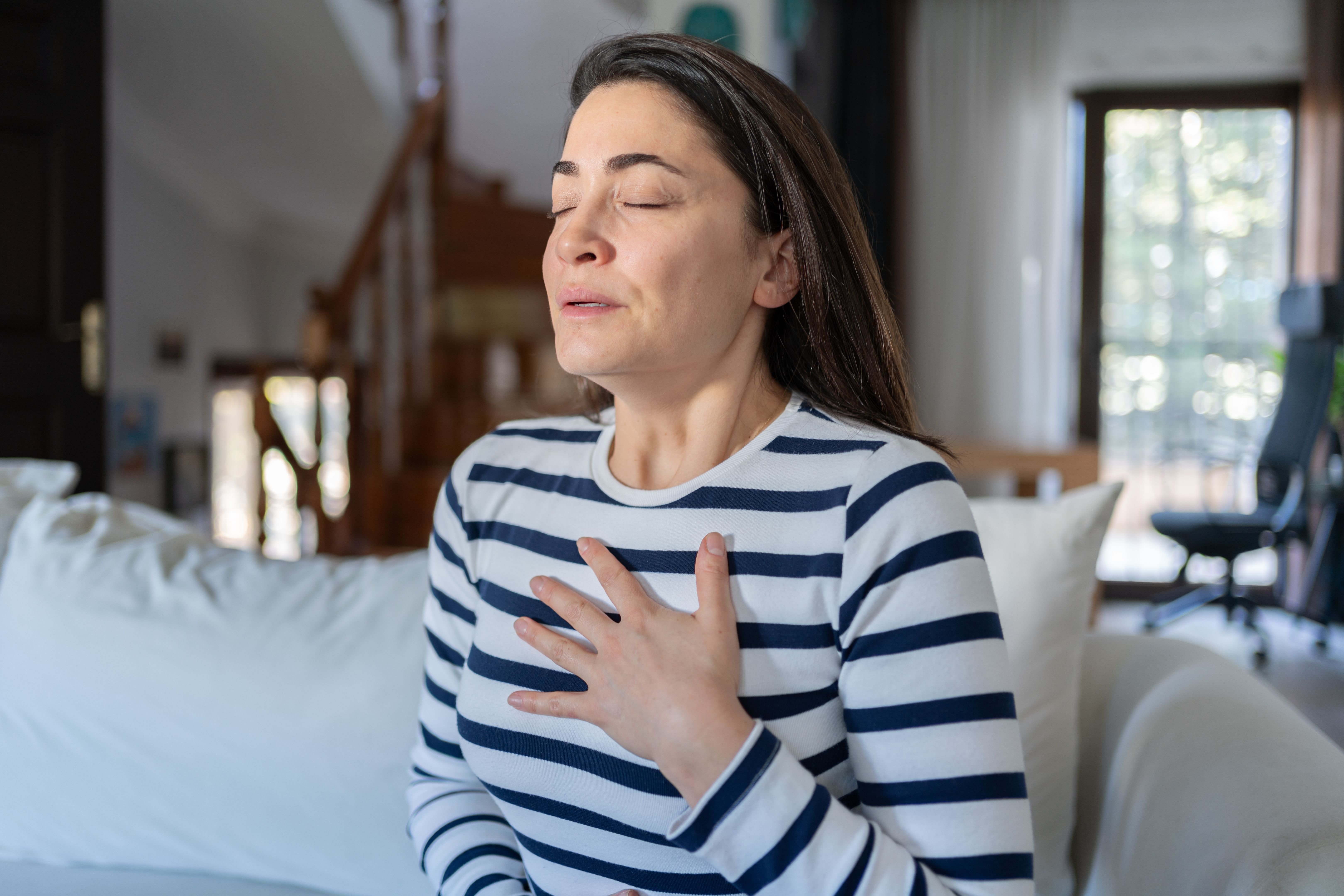 Woman In Heavy Breathing With Panic Attack