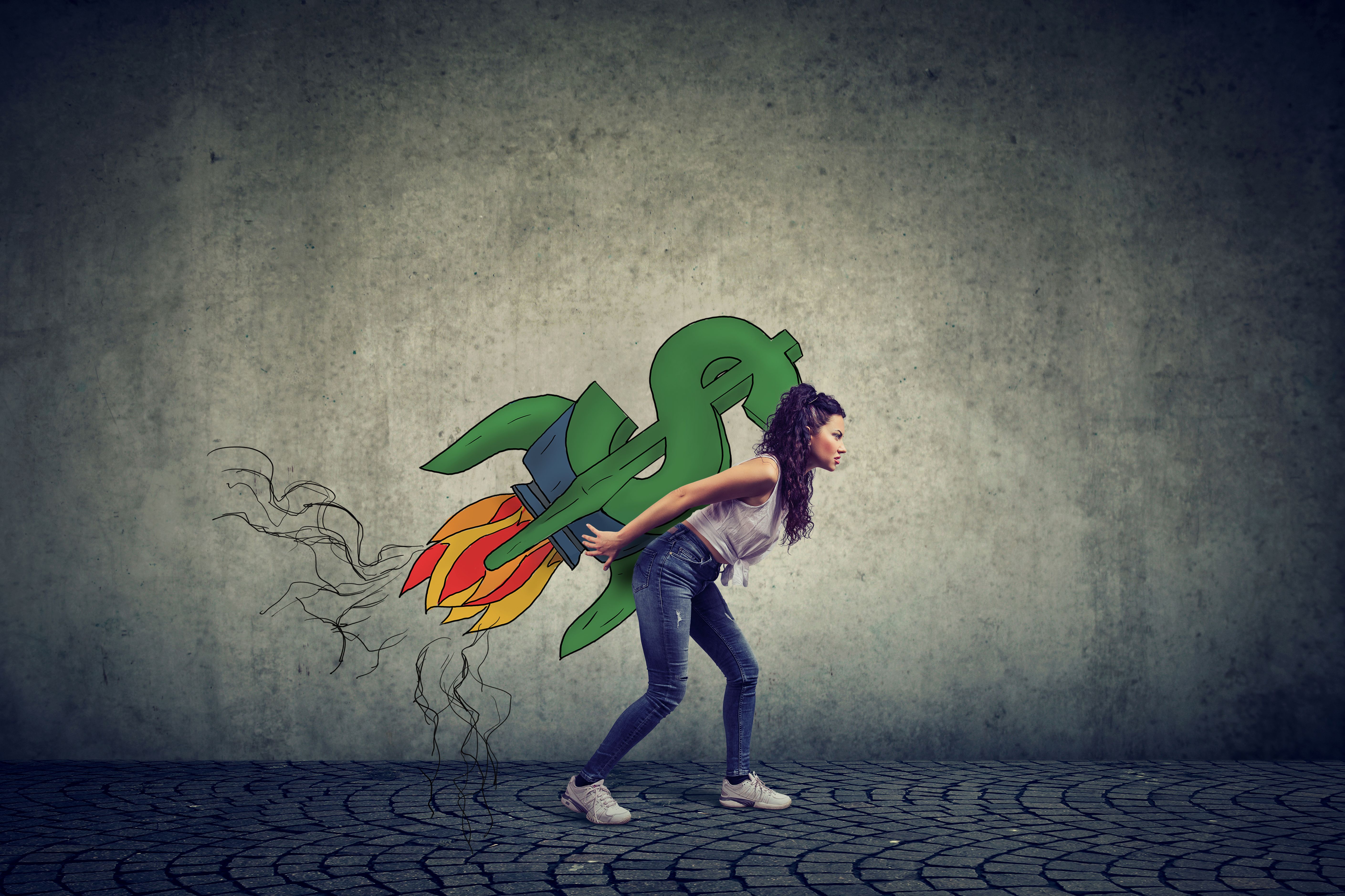 Side profile of ambitious young woman with high risky financial goals Side profile of ambitious young woman with high risky financial goals