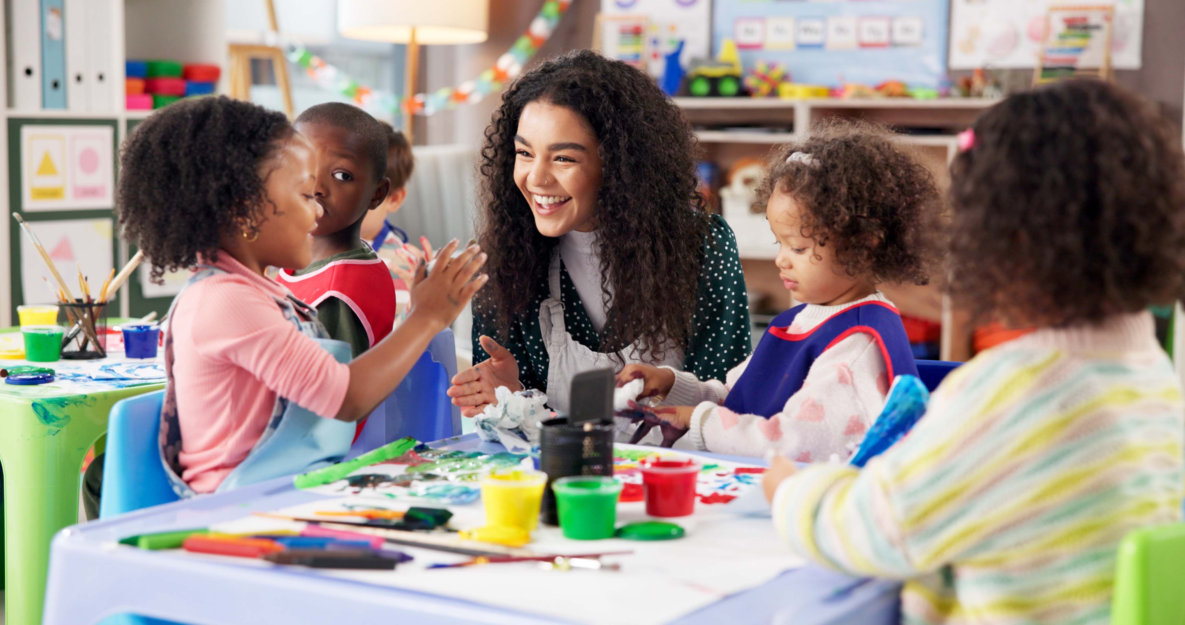 instructor teaching children