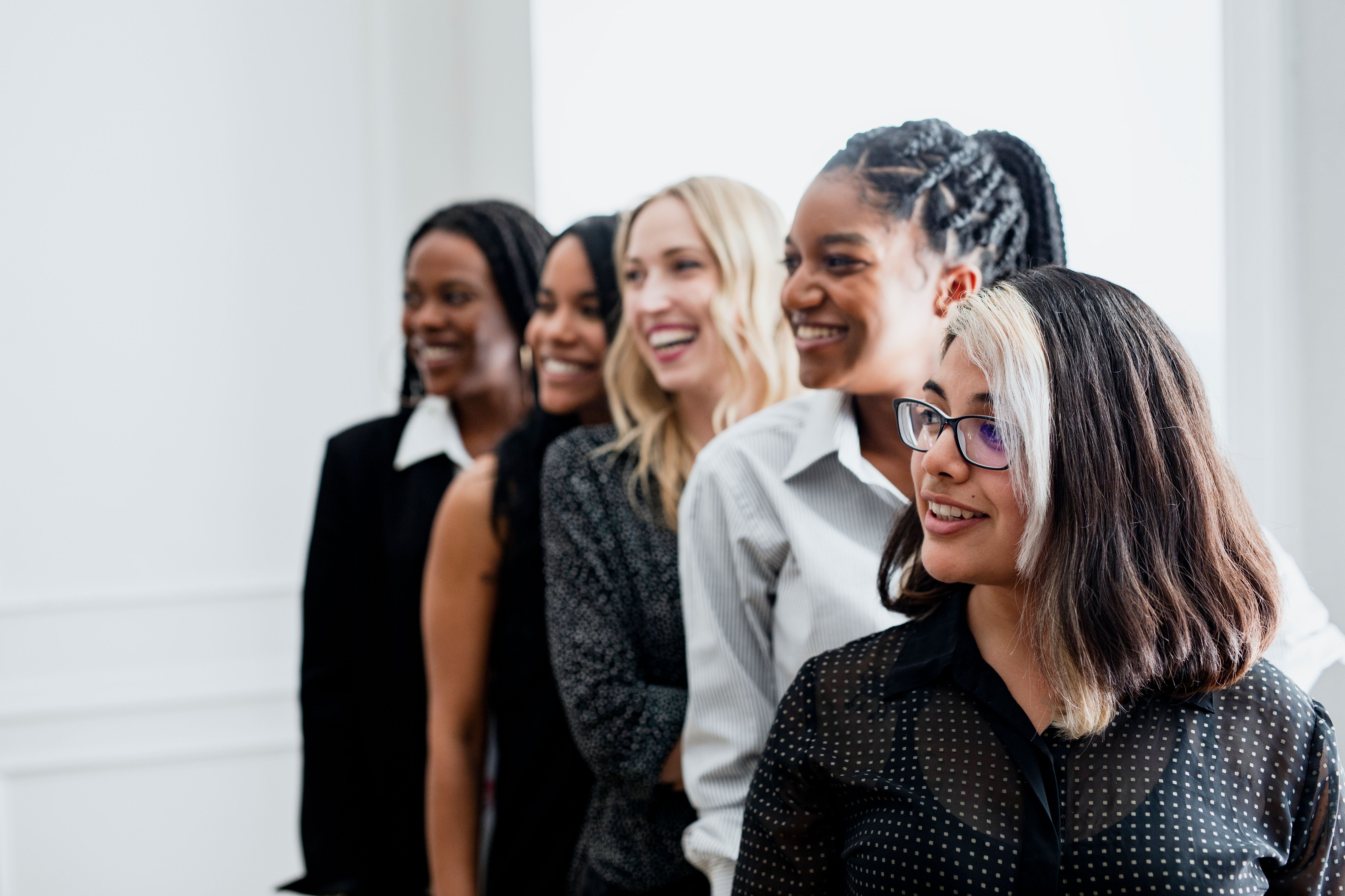 Diverse confident businesswomen standing together