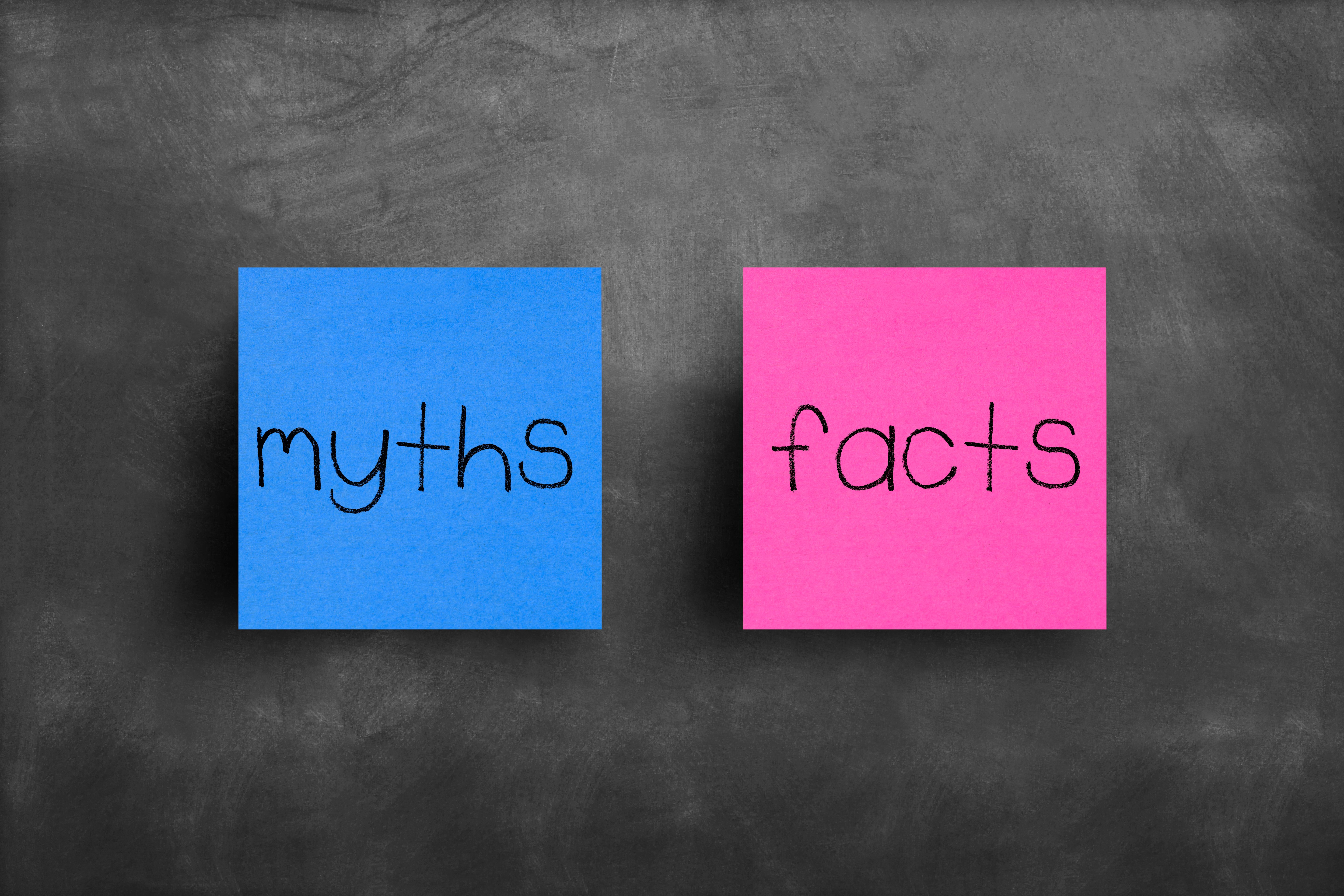 Sticky note on blackboard, Myths Facts Sticky note on blackboard, Myths Facts