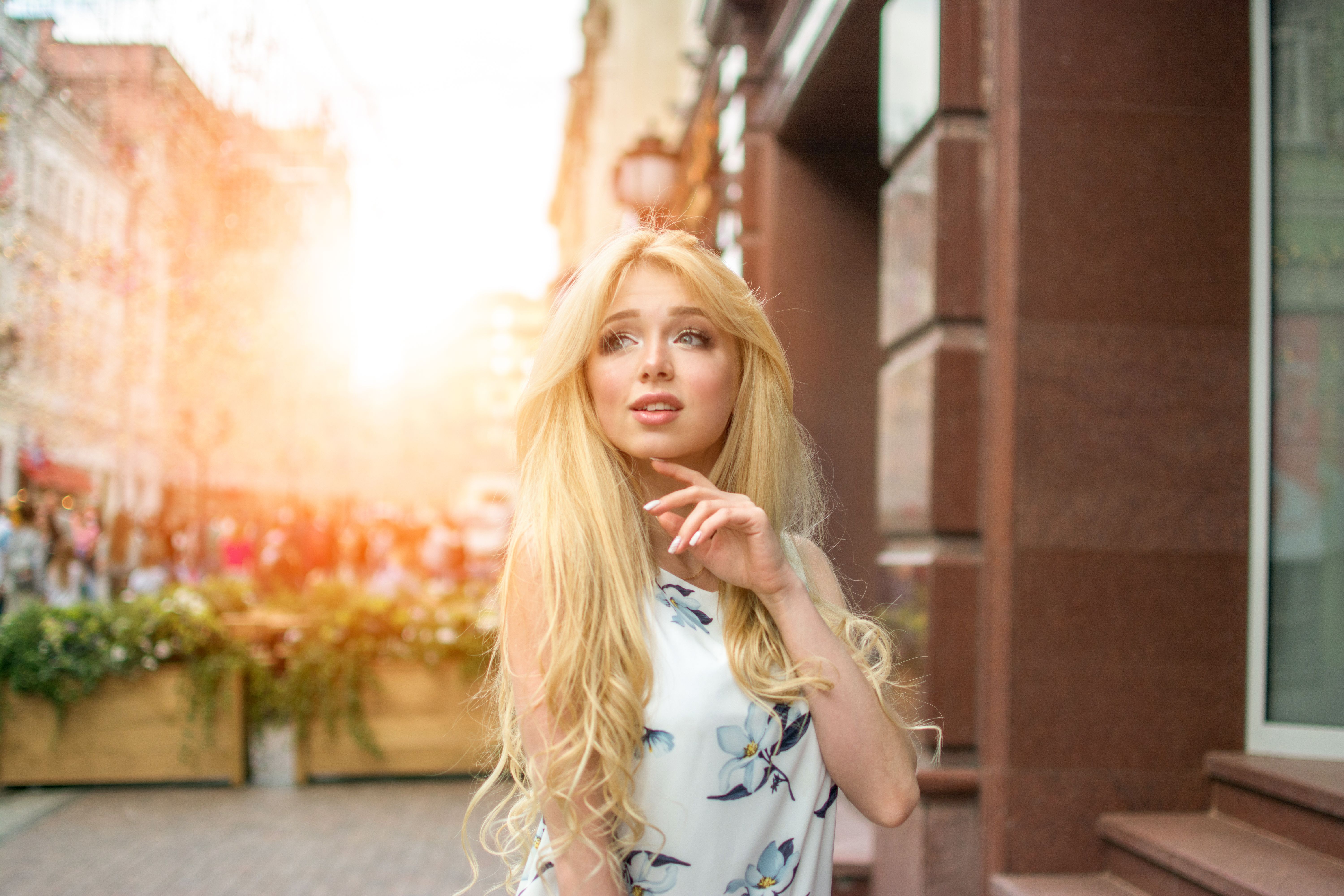 Portrait of beautiful blonde girl on the city street. Portrait of beautiful blonde girl on the city street.