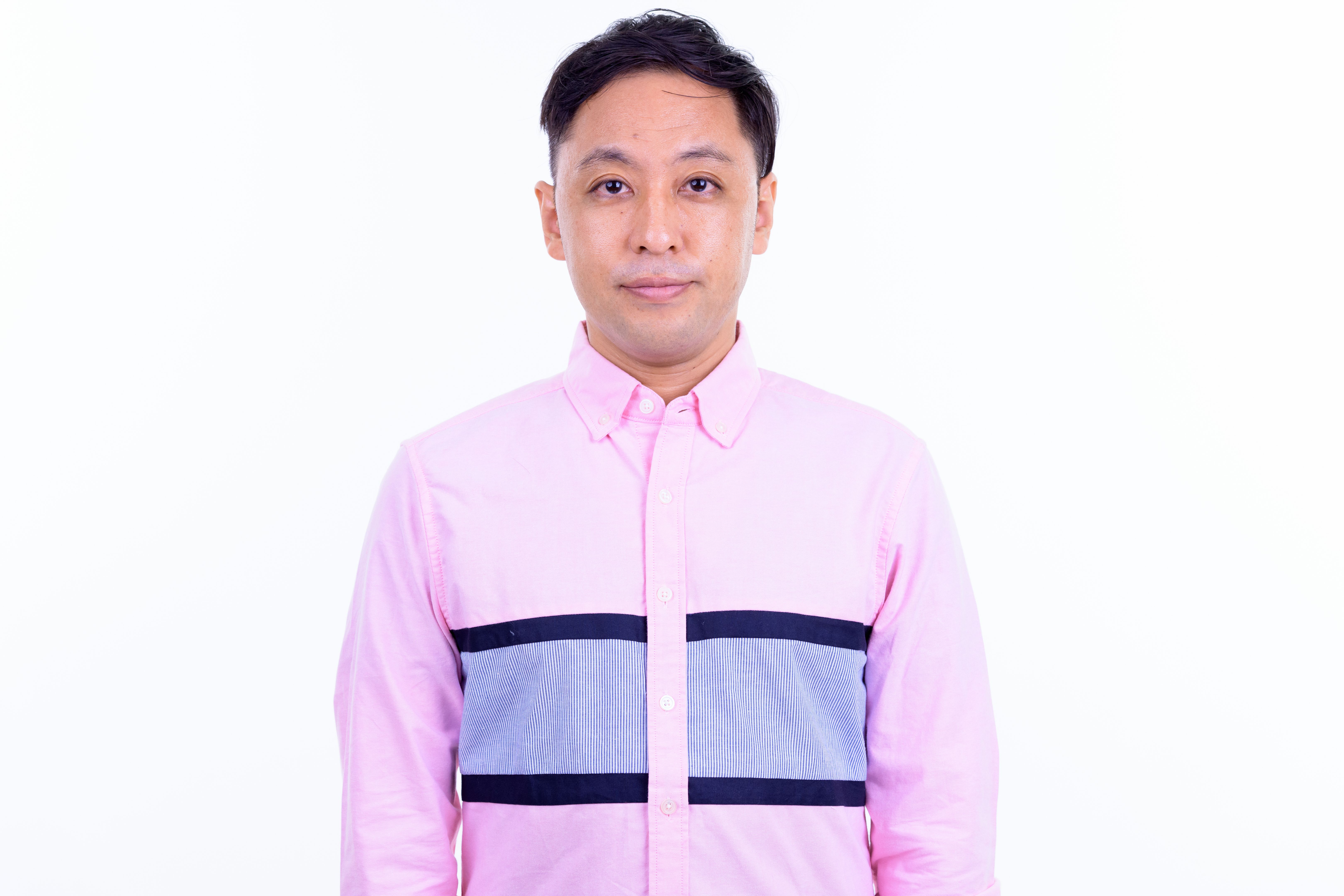 Portrait of Japanese businessman looking at camera