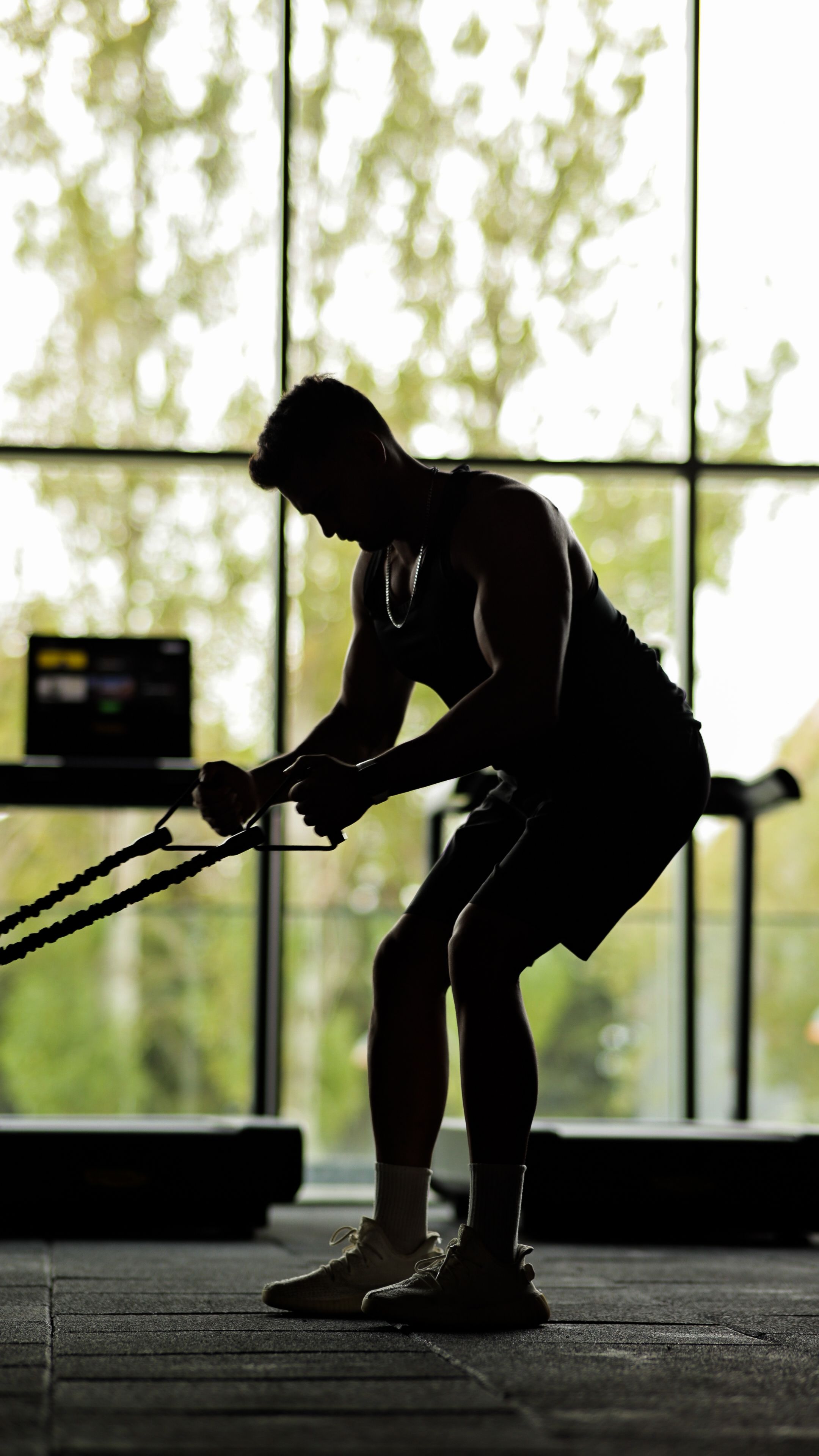 Young Man Performing Rope Exercises for Upper Body and Core Strength – Indoor Workout Focusing on Power and Endurance Young Man Performing Rope Exercises for Upper Body and Core Strength – Indoor Workout Focusing on Power and Endurance