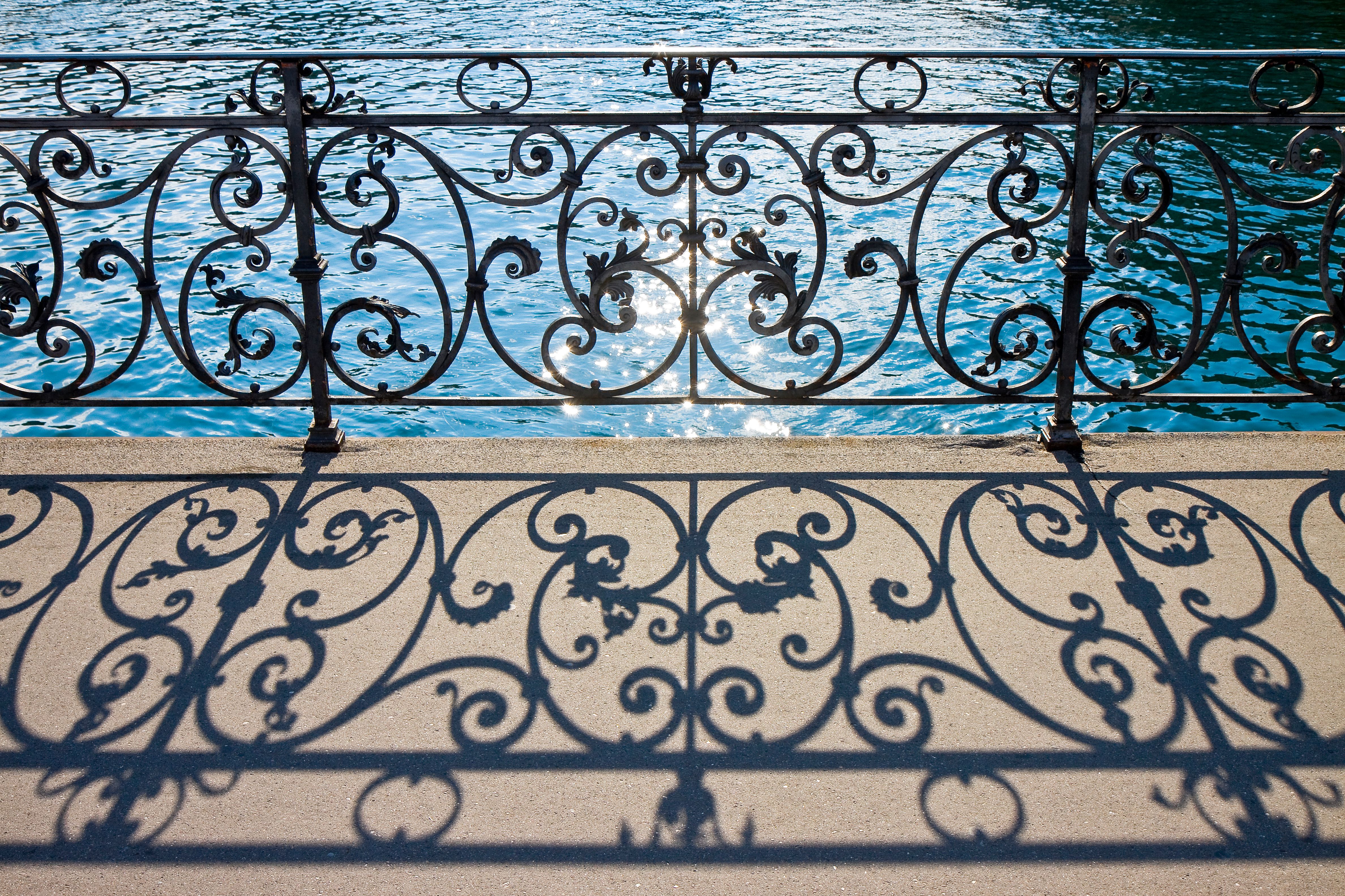 Old wrought iron railing on a walkway in Lucerne (Switzerland) - image with copy space Old wrought iron railing on a walkway in Lucerne (Switzerland) - image with copy space