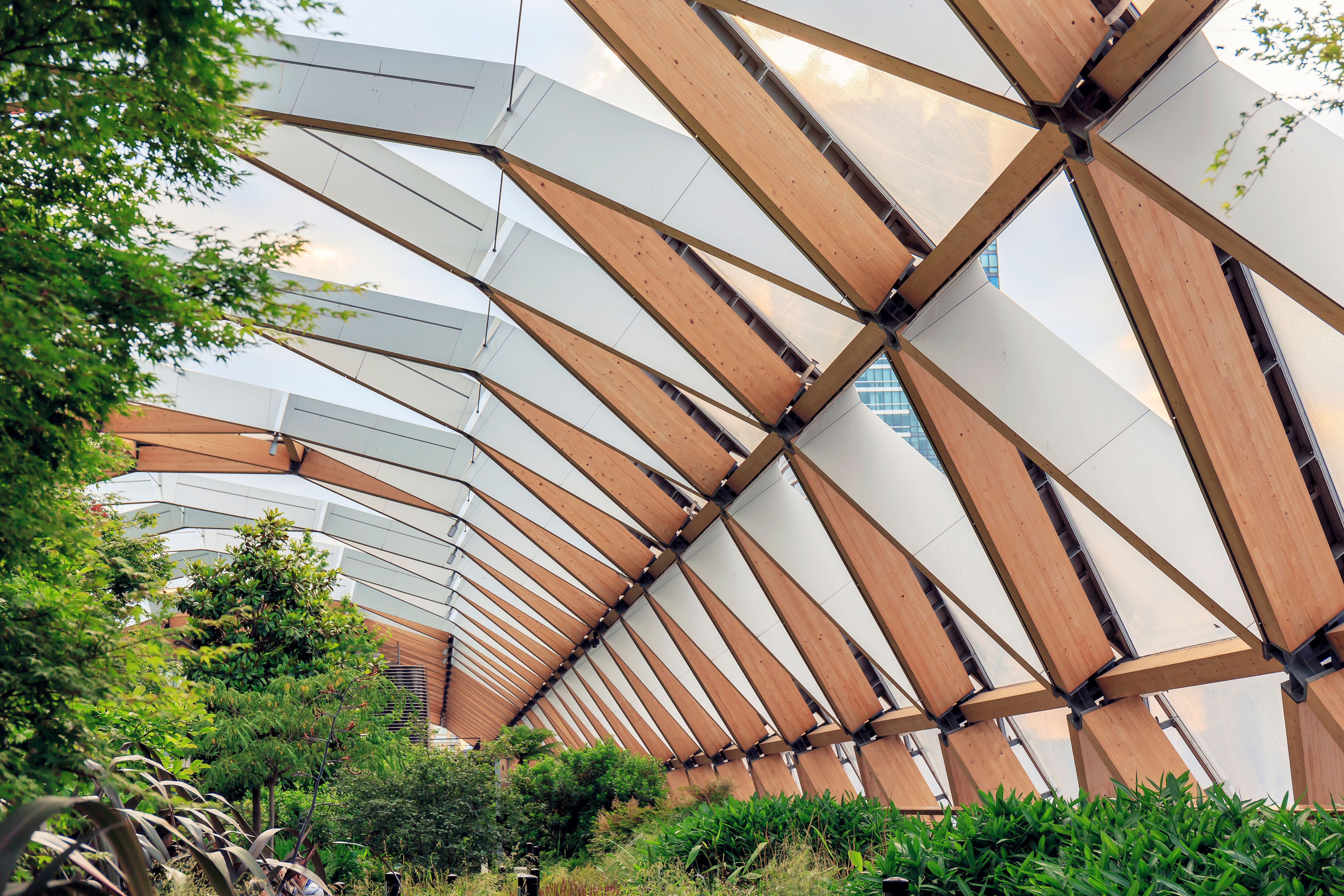 High-tech timber structure above a public park in Canary Wharf London