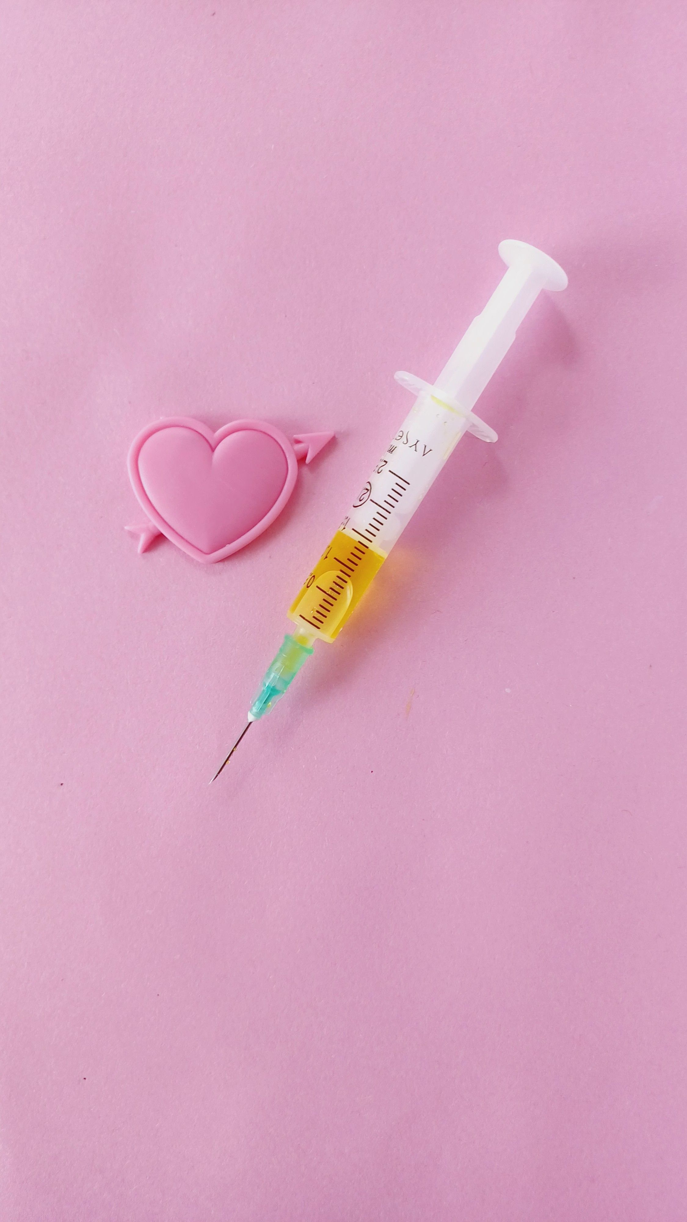 pharmacist administering vaccine