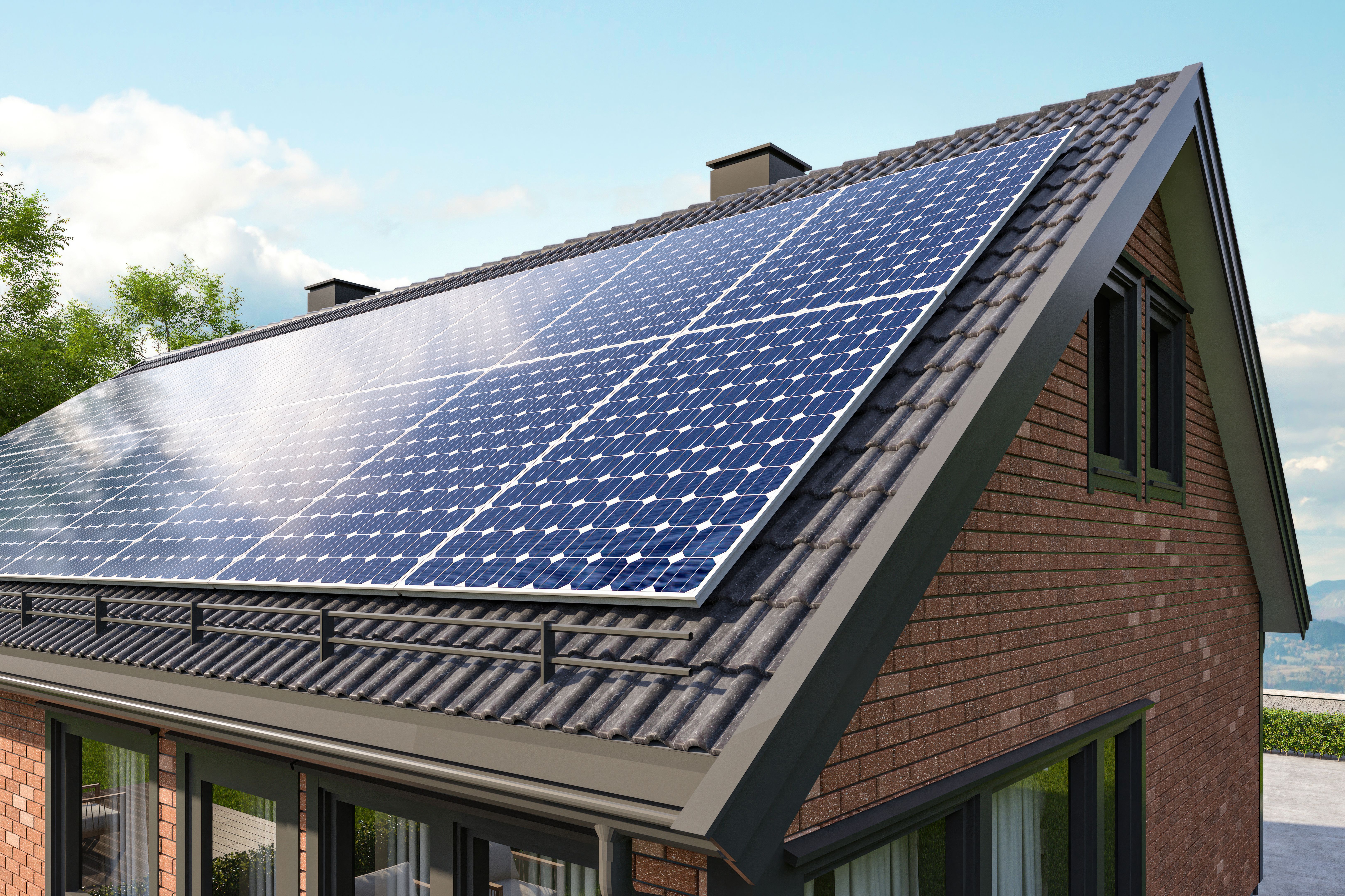 Solar Panels on a Roof of Modern Brick House