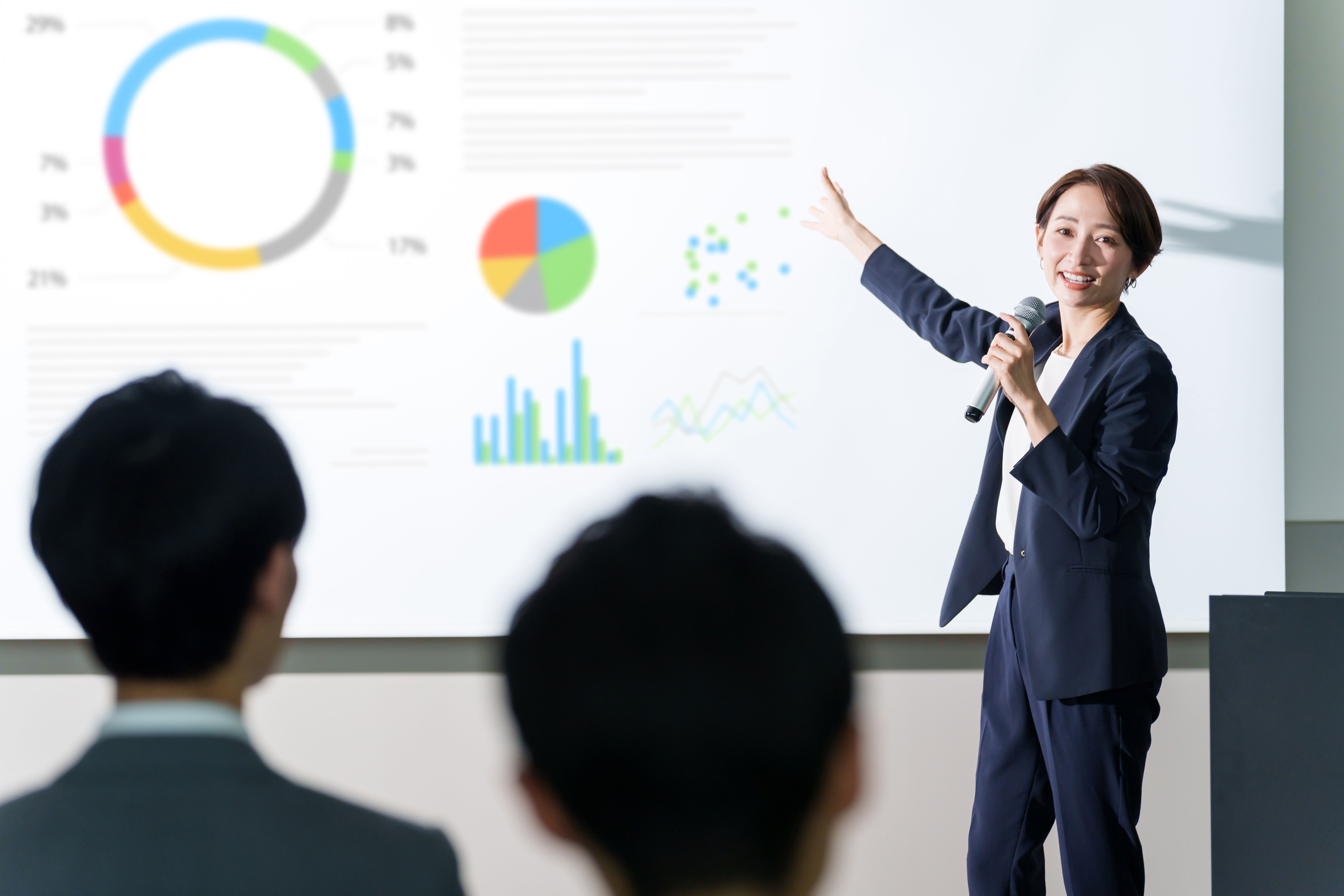asian businesswoman giving a presentation in a conference room asian businesswoman giving a presentation in a conference room