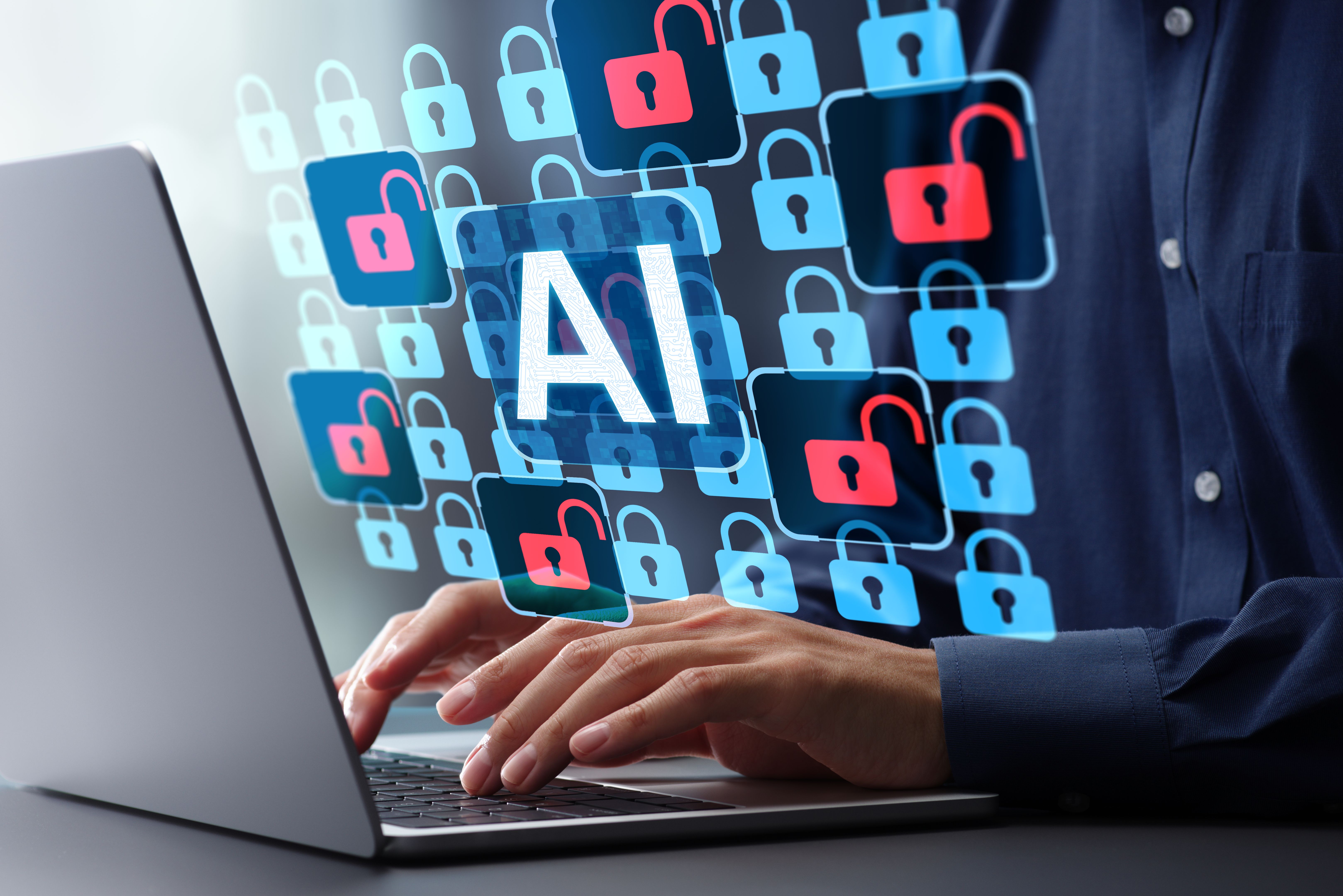 AI-based automated security vulnerability scanning. Artificial intelligence-driven network monitoring and data protection. Security engineer using laptop computer to address security vulnerabilities.