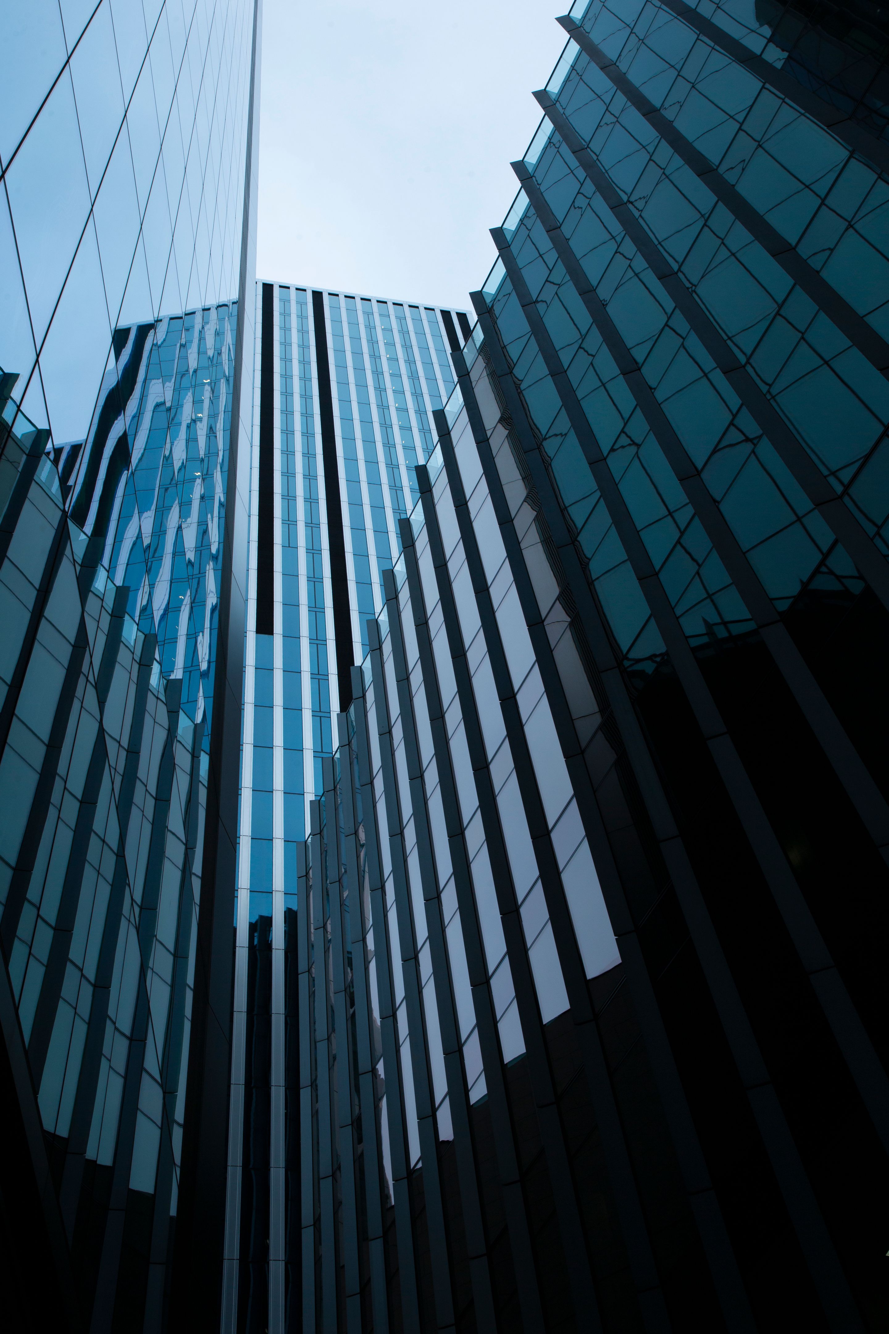 Looking directly up at the skyline of the financial district in central London-3