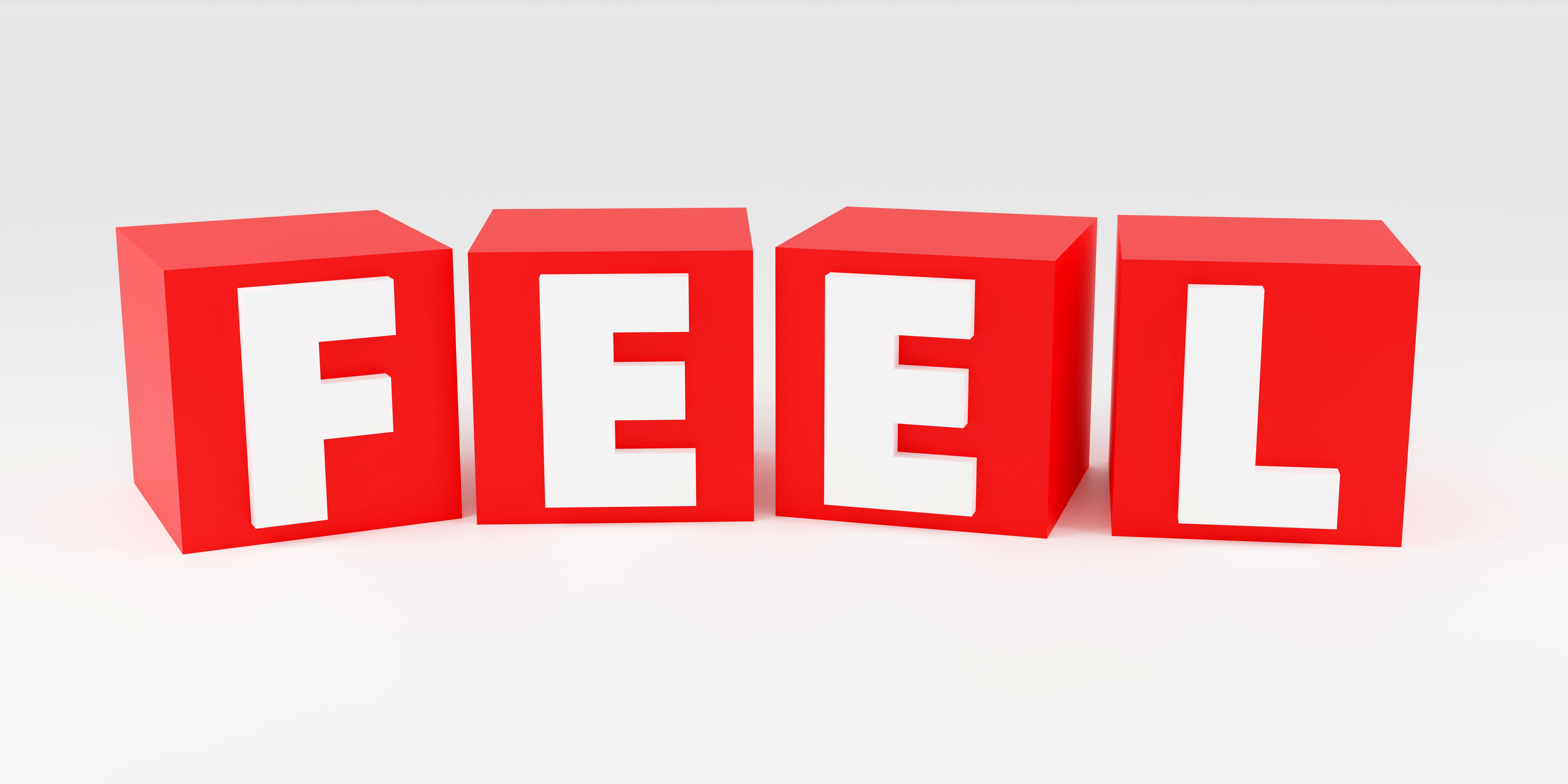 Luxury red cubes inscription feel on grey podium, soft light, smooth background, 3d rendering Luxury red cubes inscription feel on grey podium, soft light, smooth background, 3d rendering