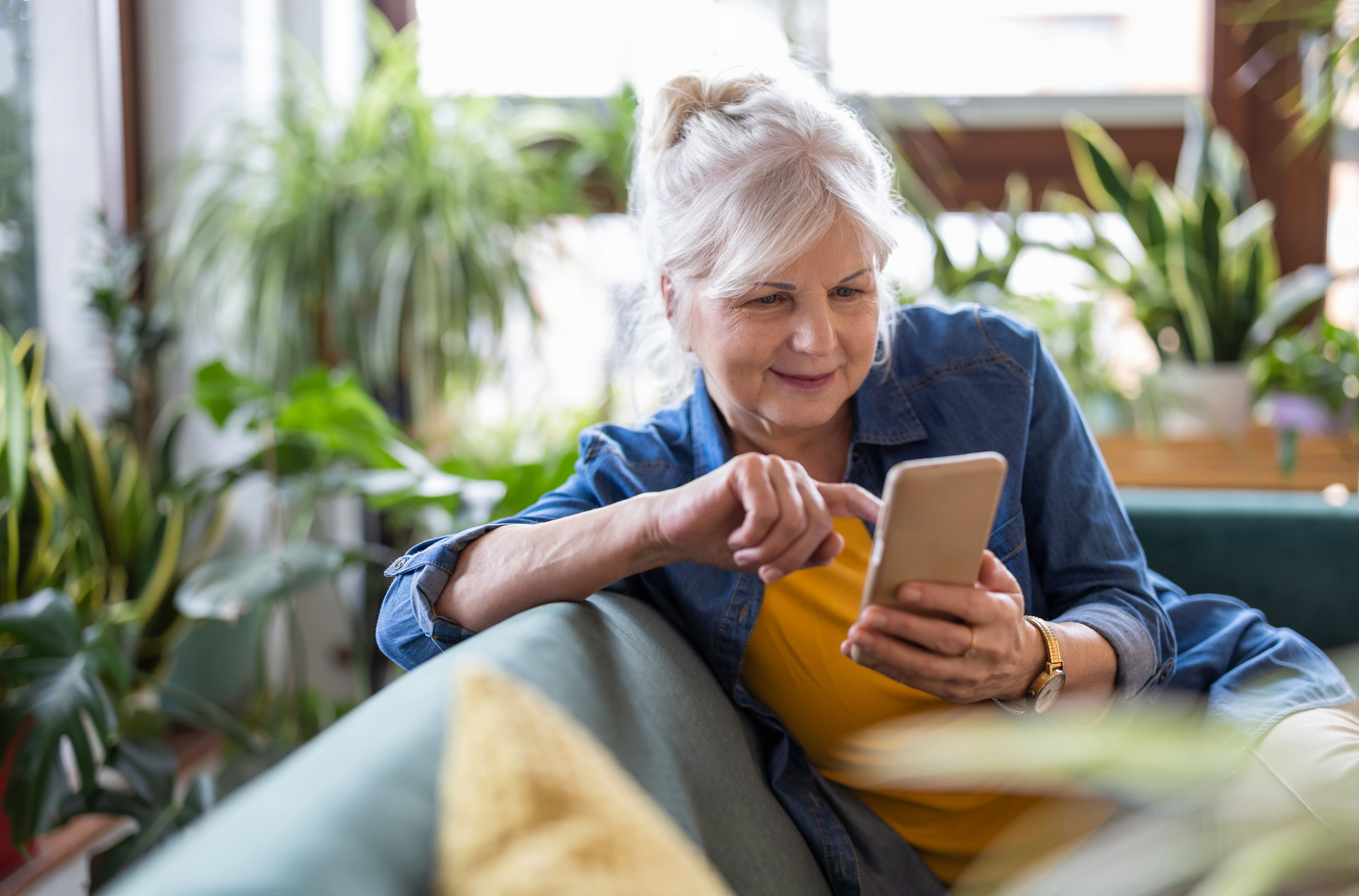 senior using smartphone