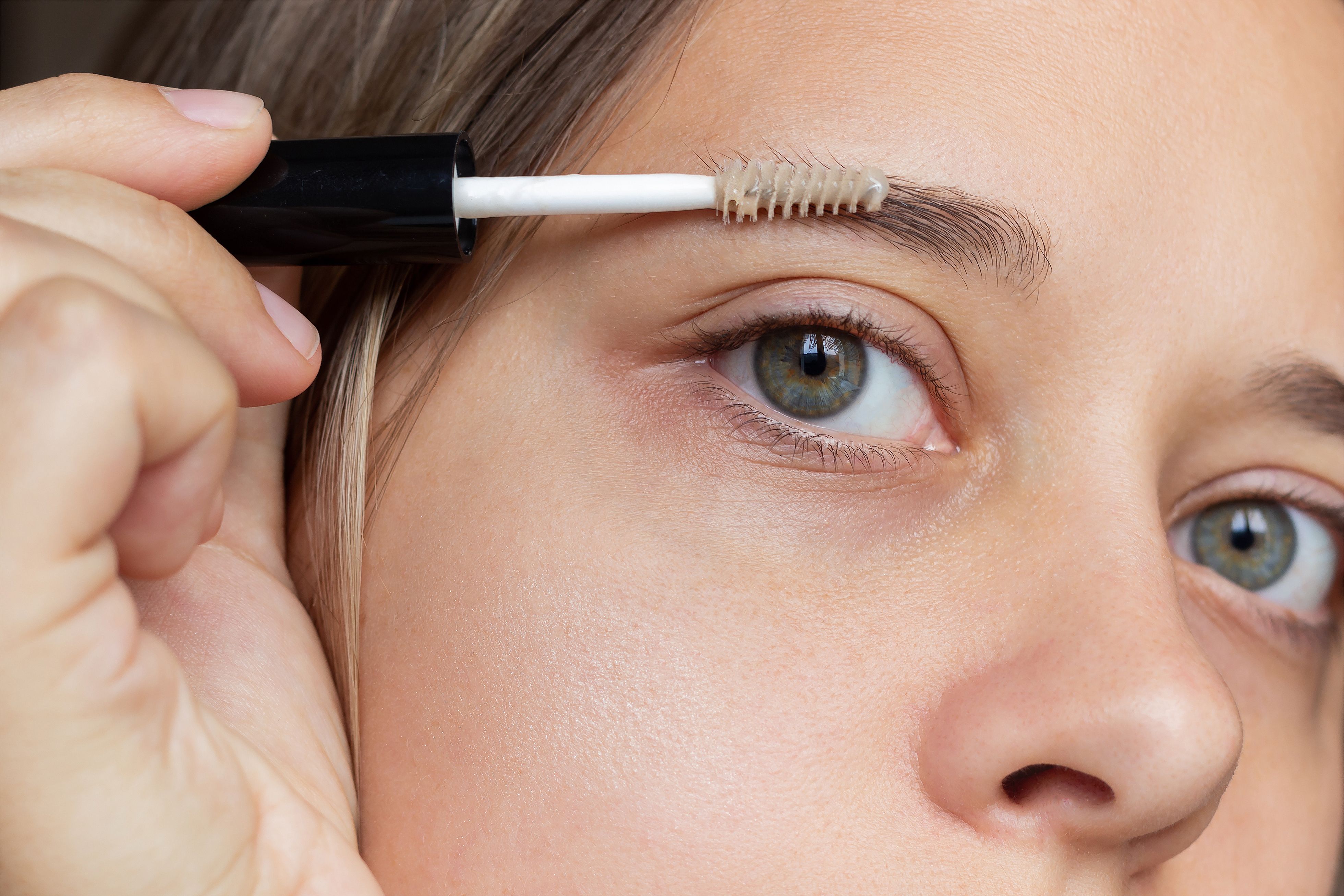 applying brow oil