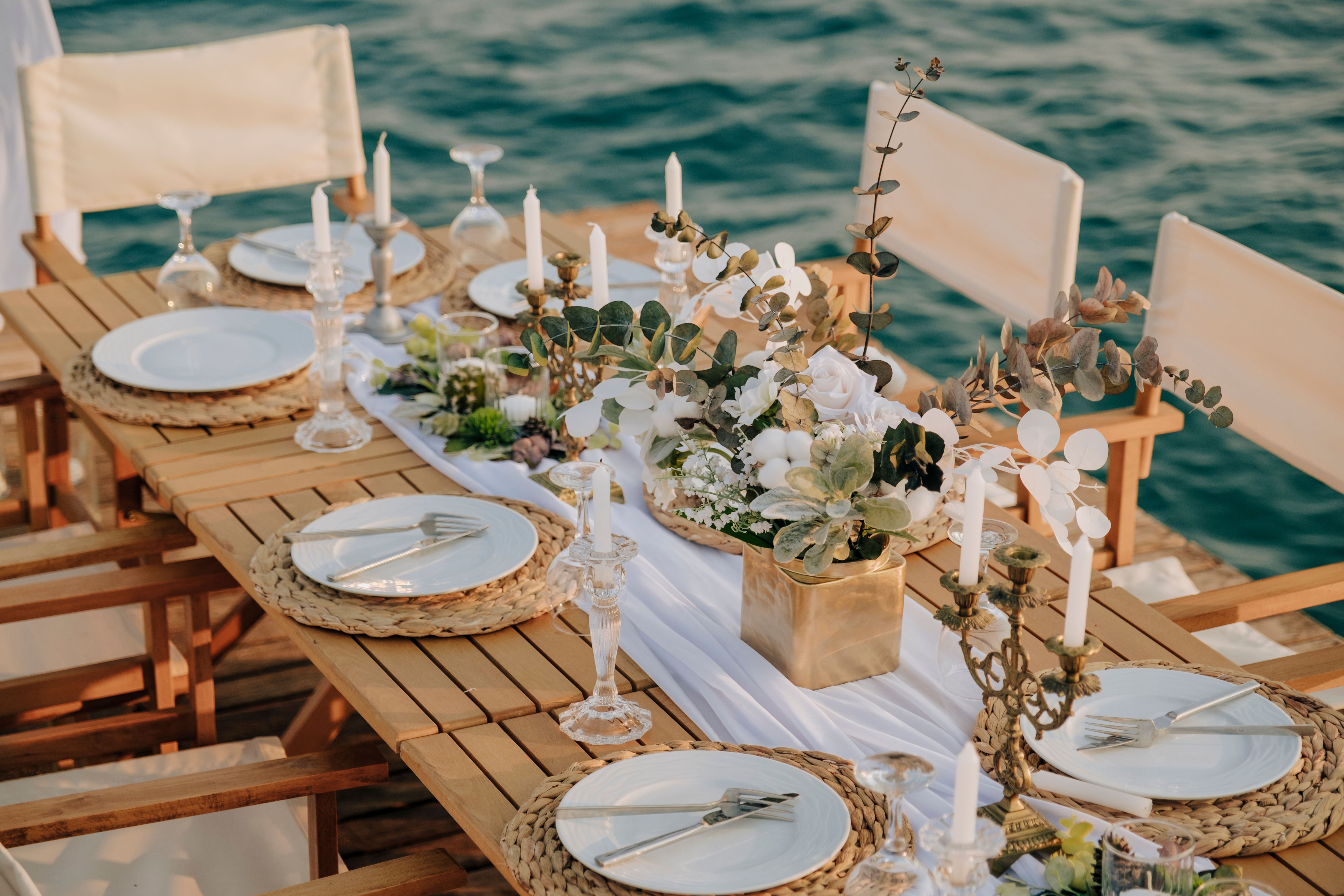 image of a wedding celebration table by the sea