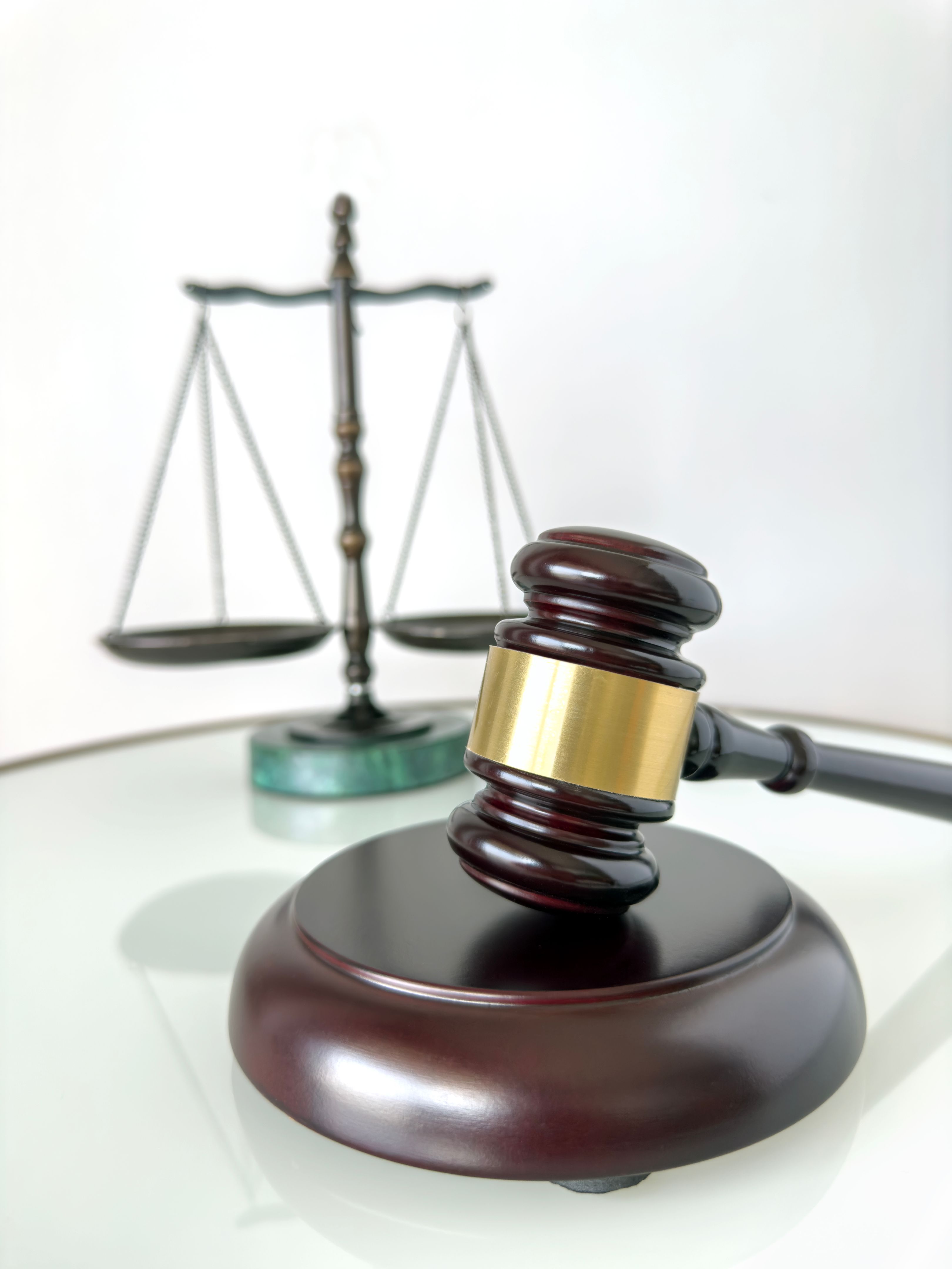 Wood gavel and scale of justice