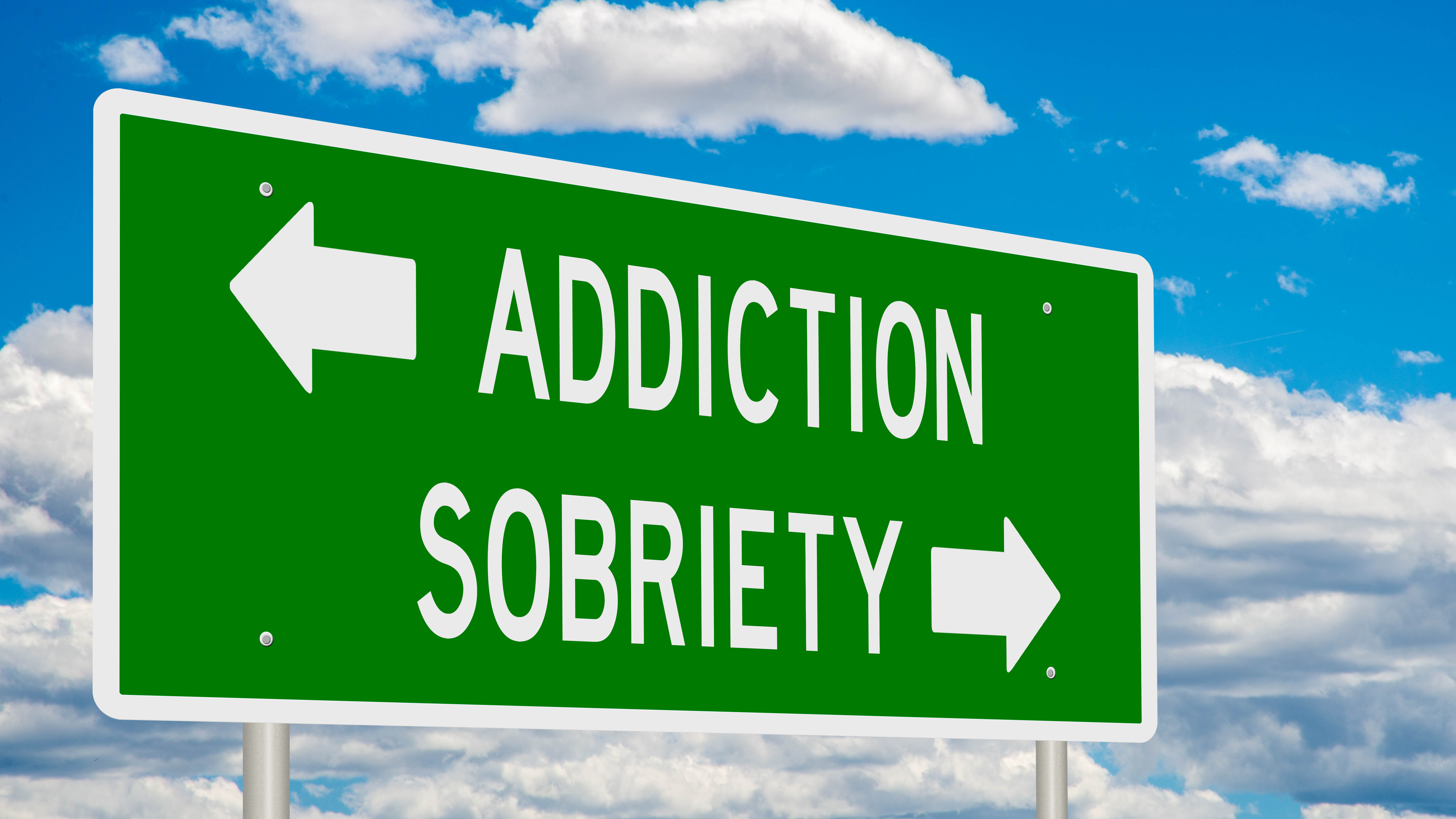 Rendered green highway sign illustrating a choice