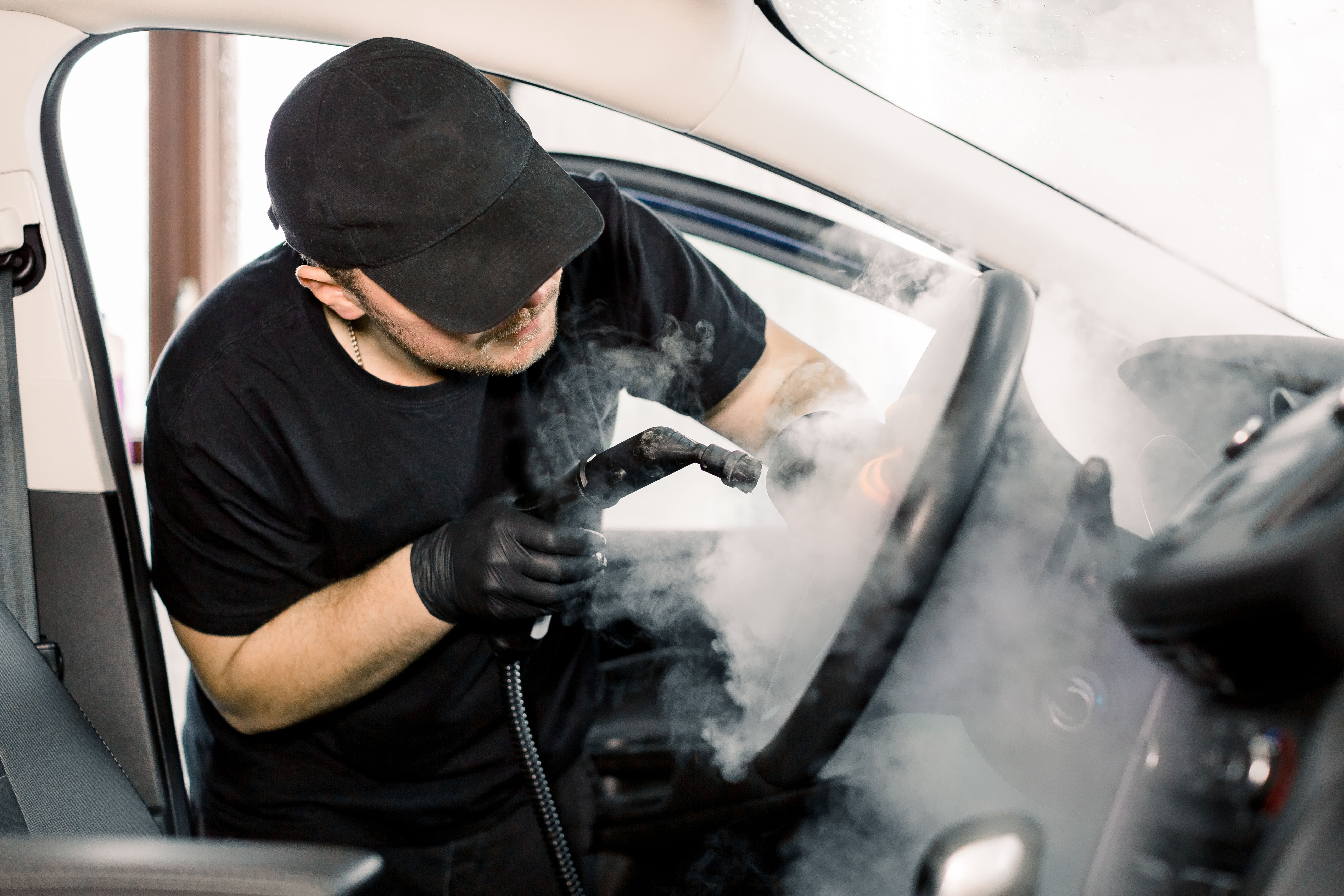 steam cleaning car