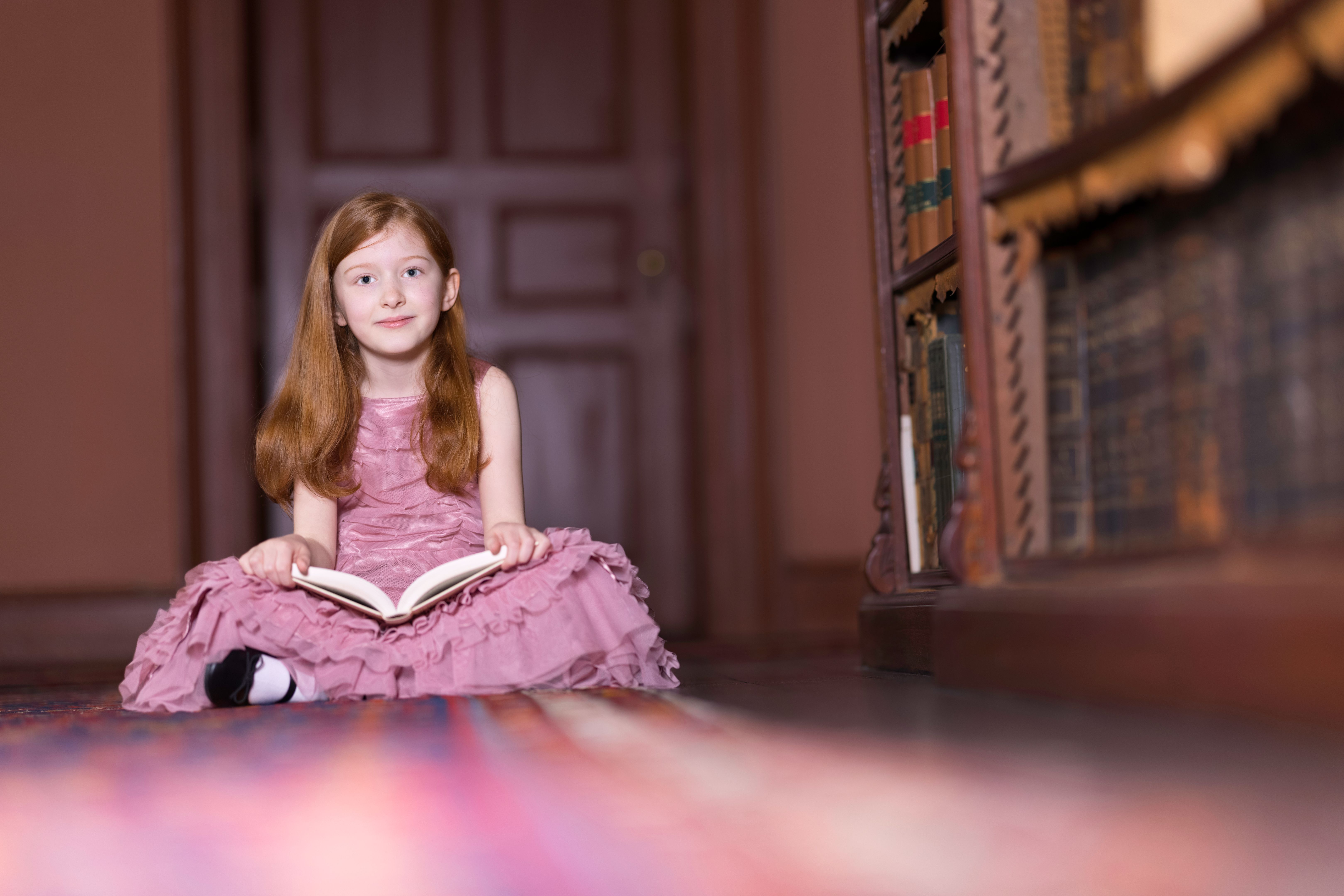 Cute little girl wearing her party dress