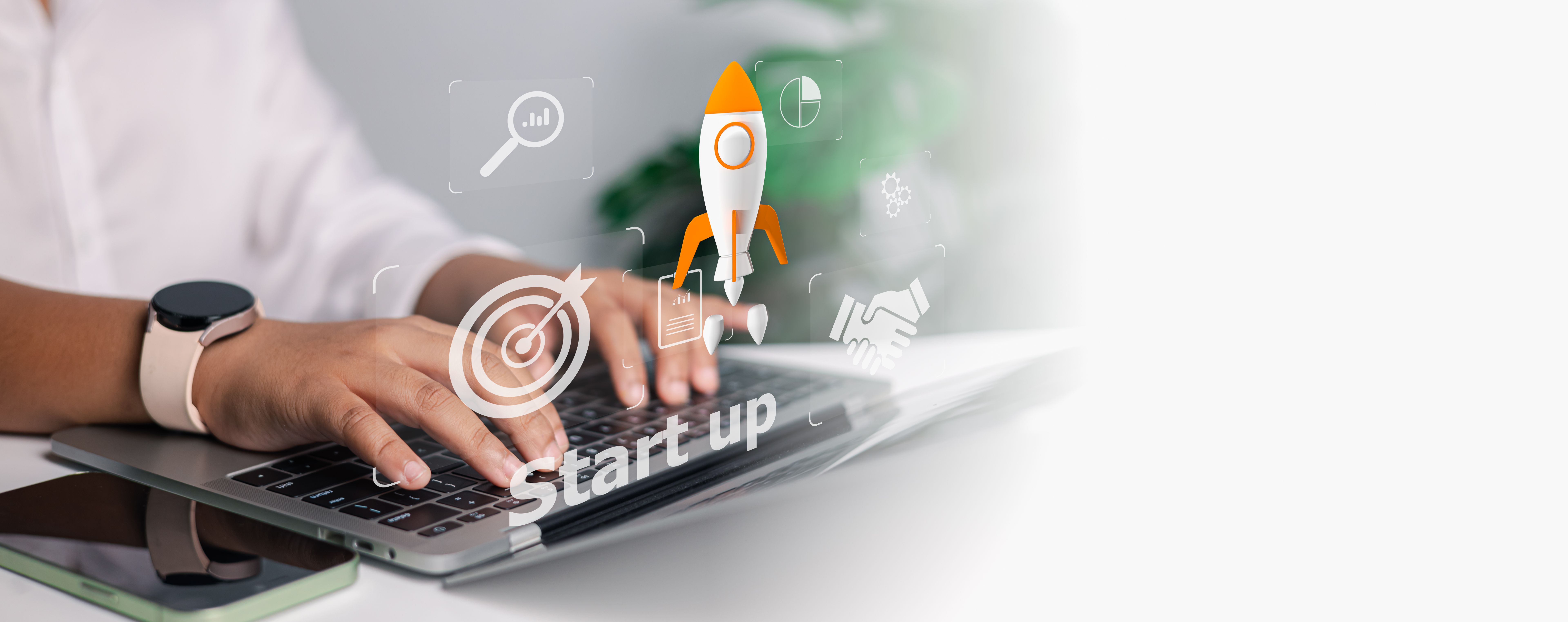 Startup Business Launch and Digital Innovation Concept with Rocket Icon and Laptop