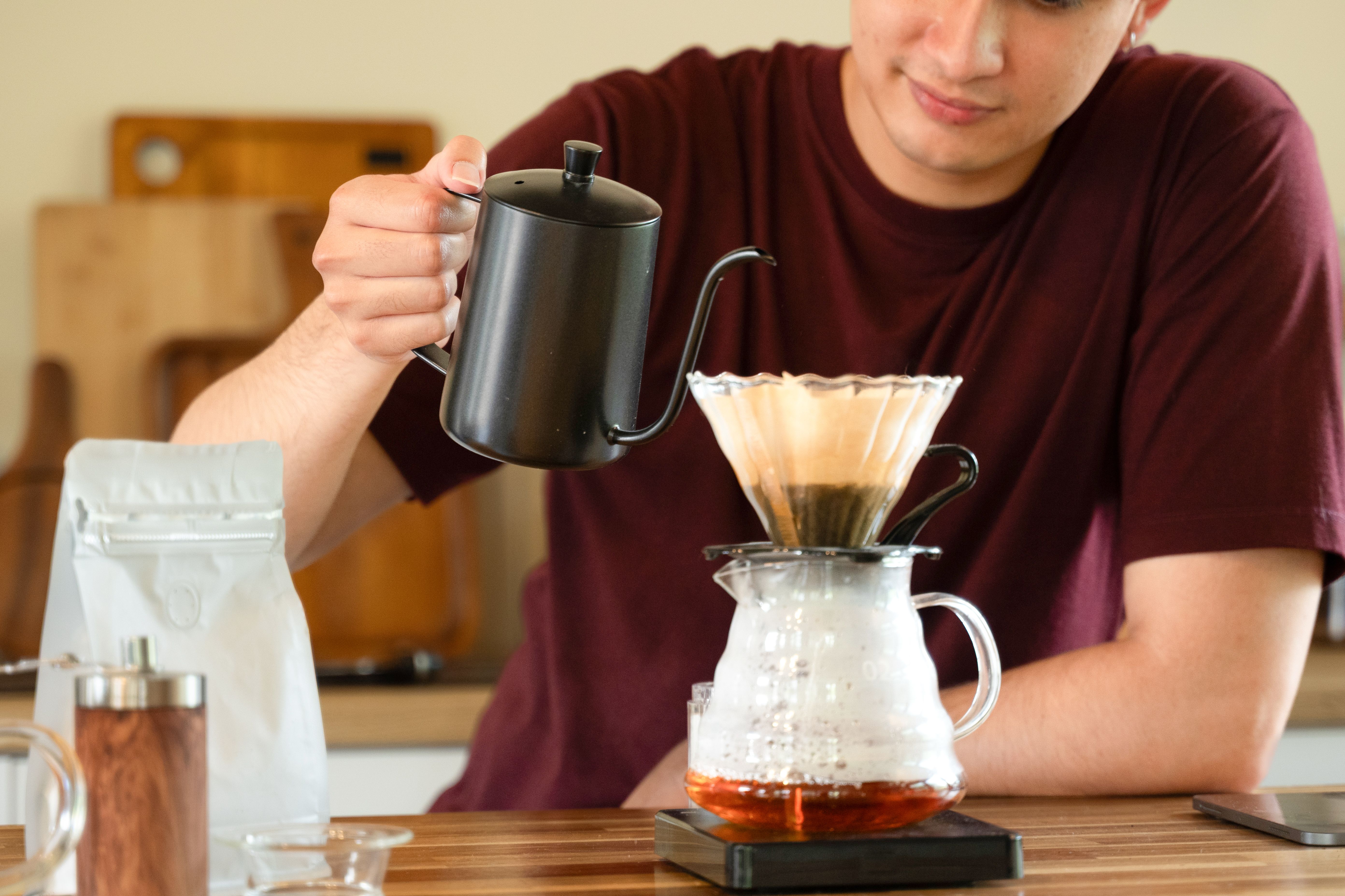 barista brewing coffee