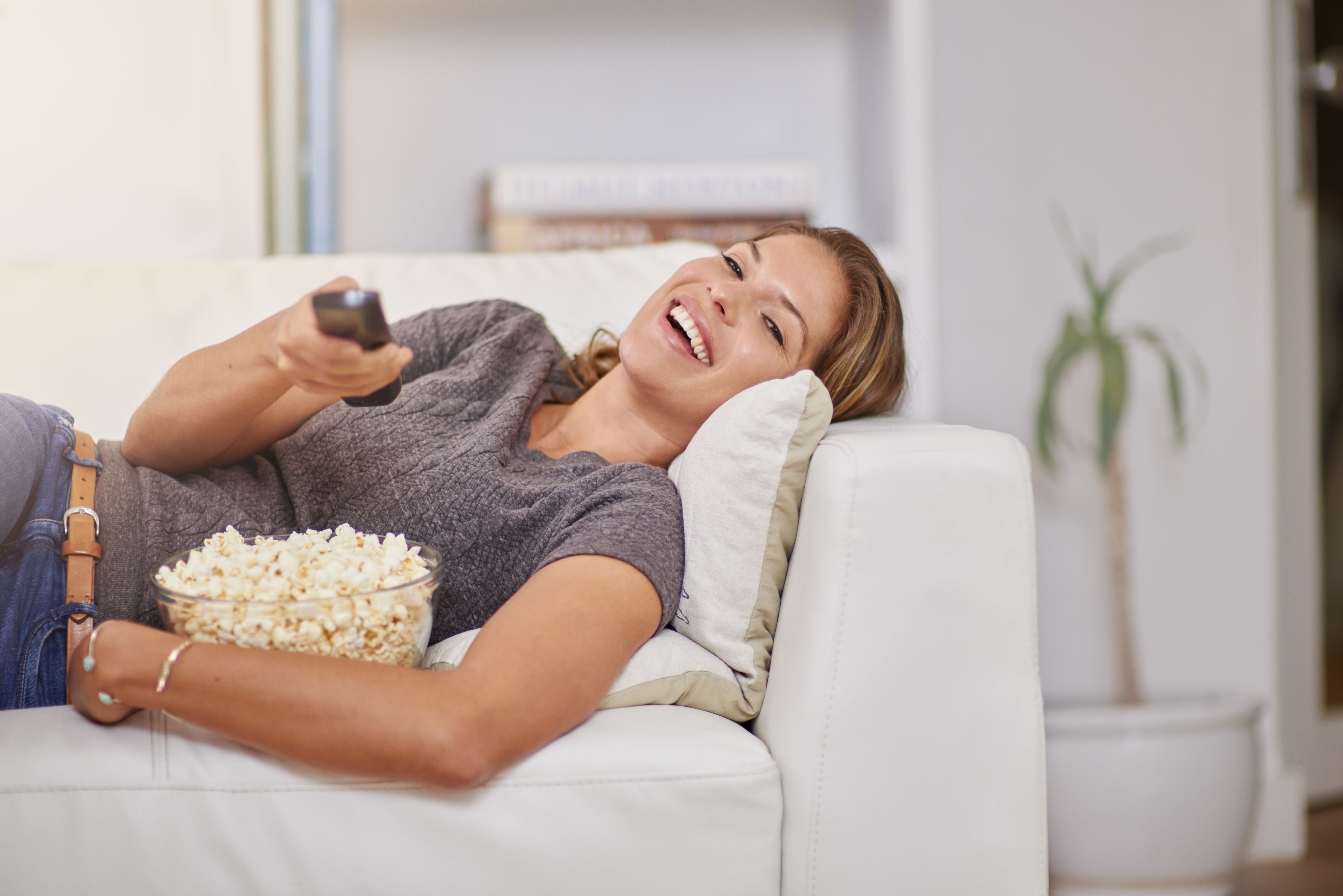 Kicking back with a comedy on the couch