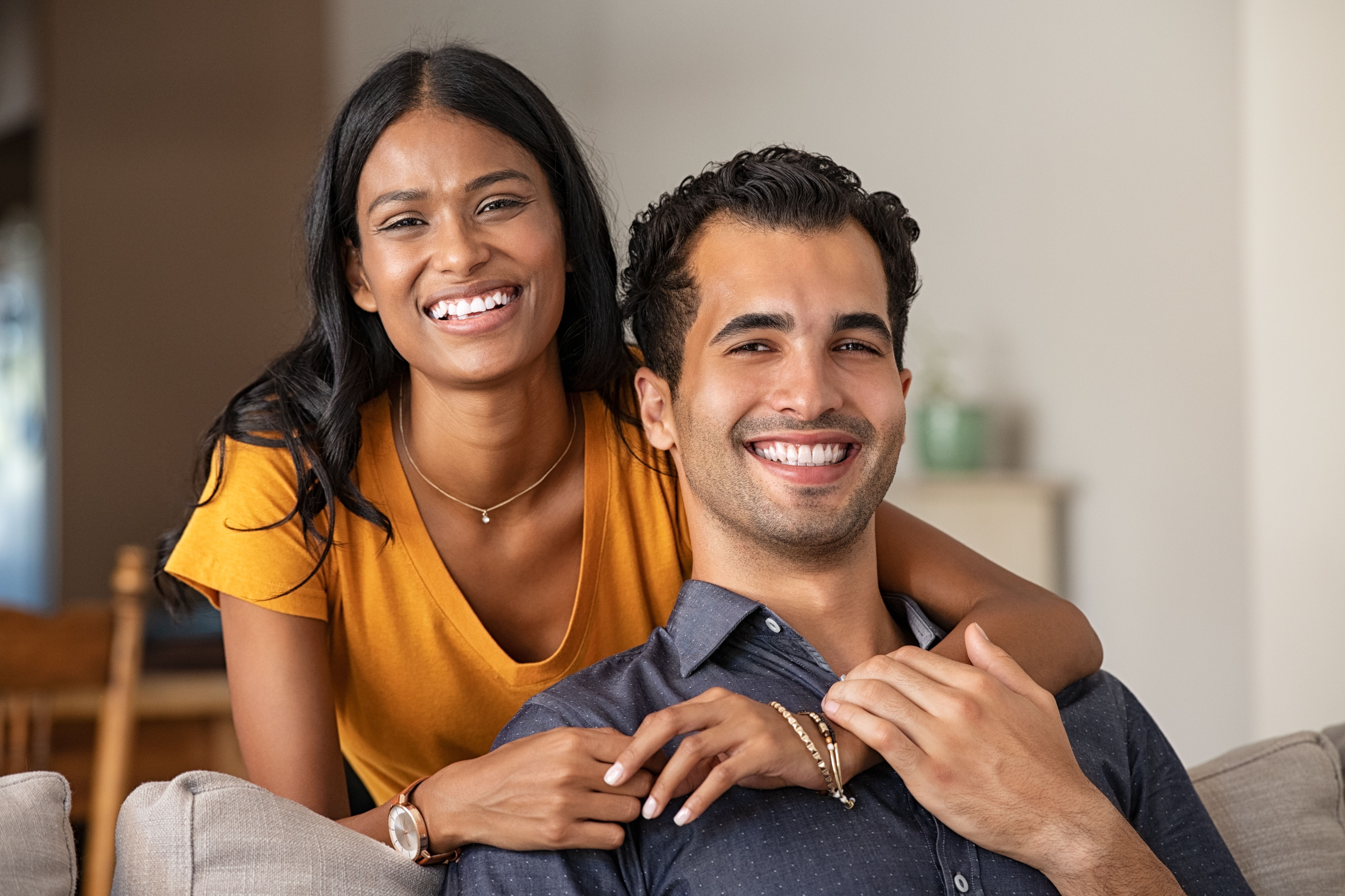 Happy indian couple at home portrait