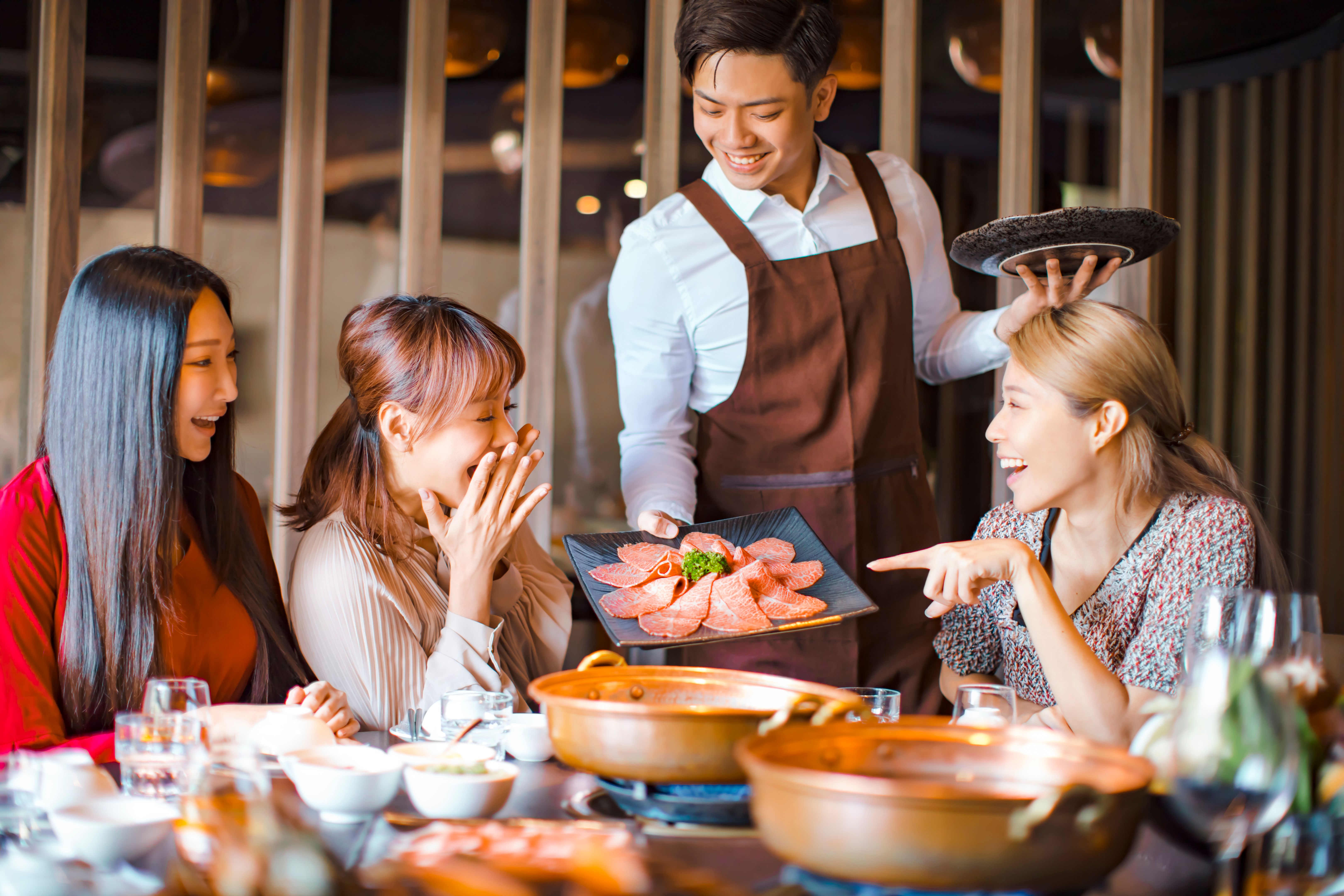 friends enjoying hot pot