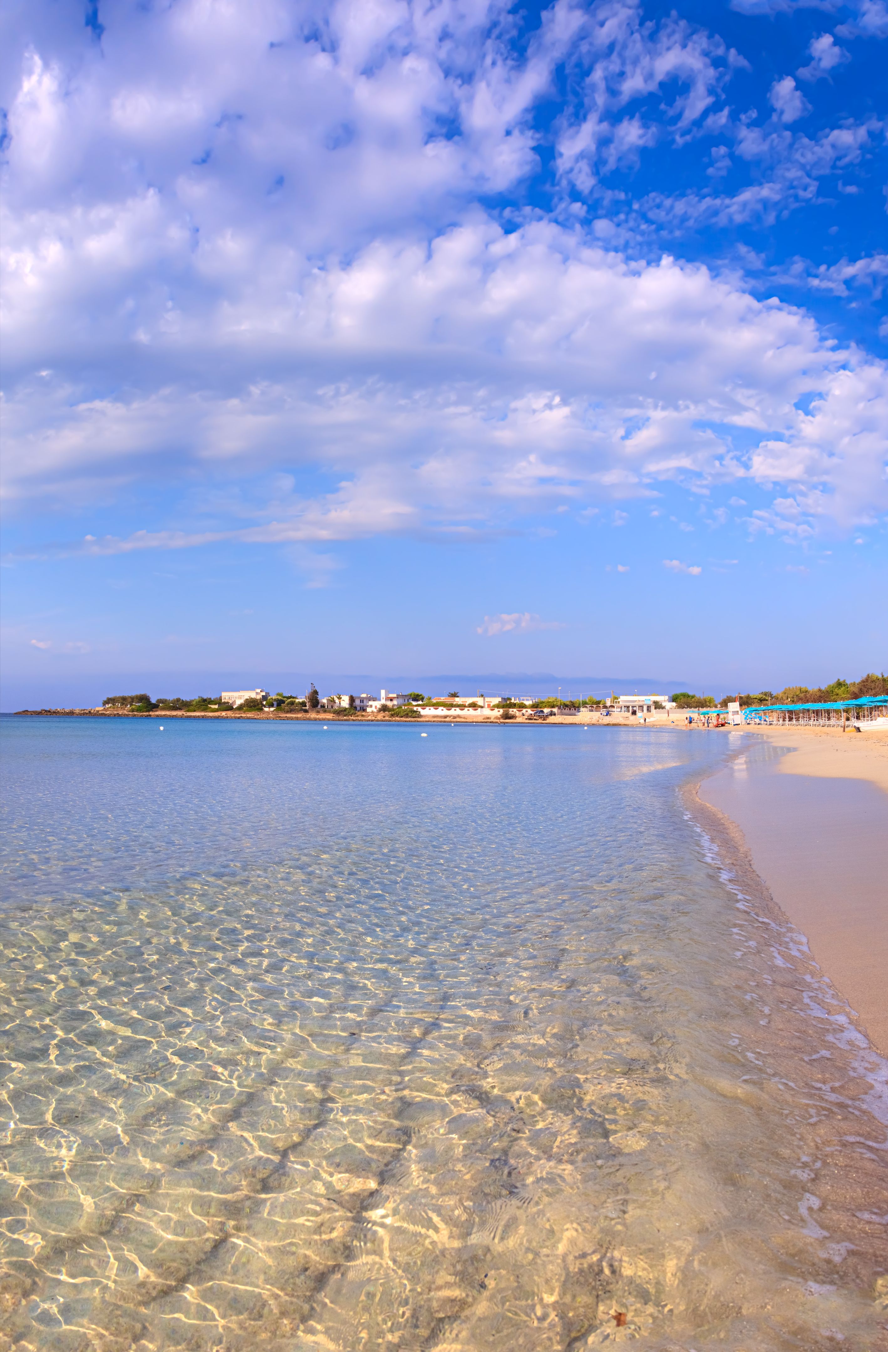 The most beautiful beaches of Apulia, Italy: on the border between the provinces of Lecce and Taranto, Punta Prosciutto Beach is a stretch of Salento coast, part of the Municipality of Porto Cesareo.