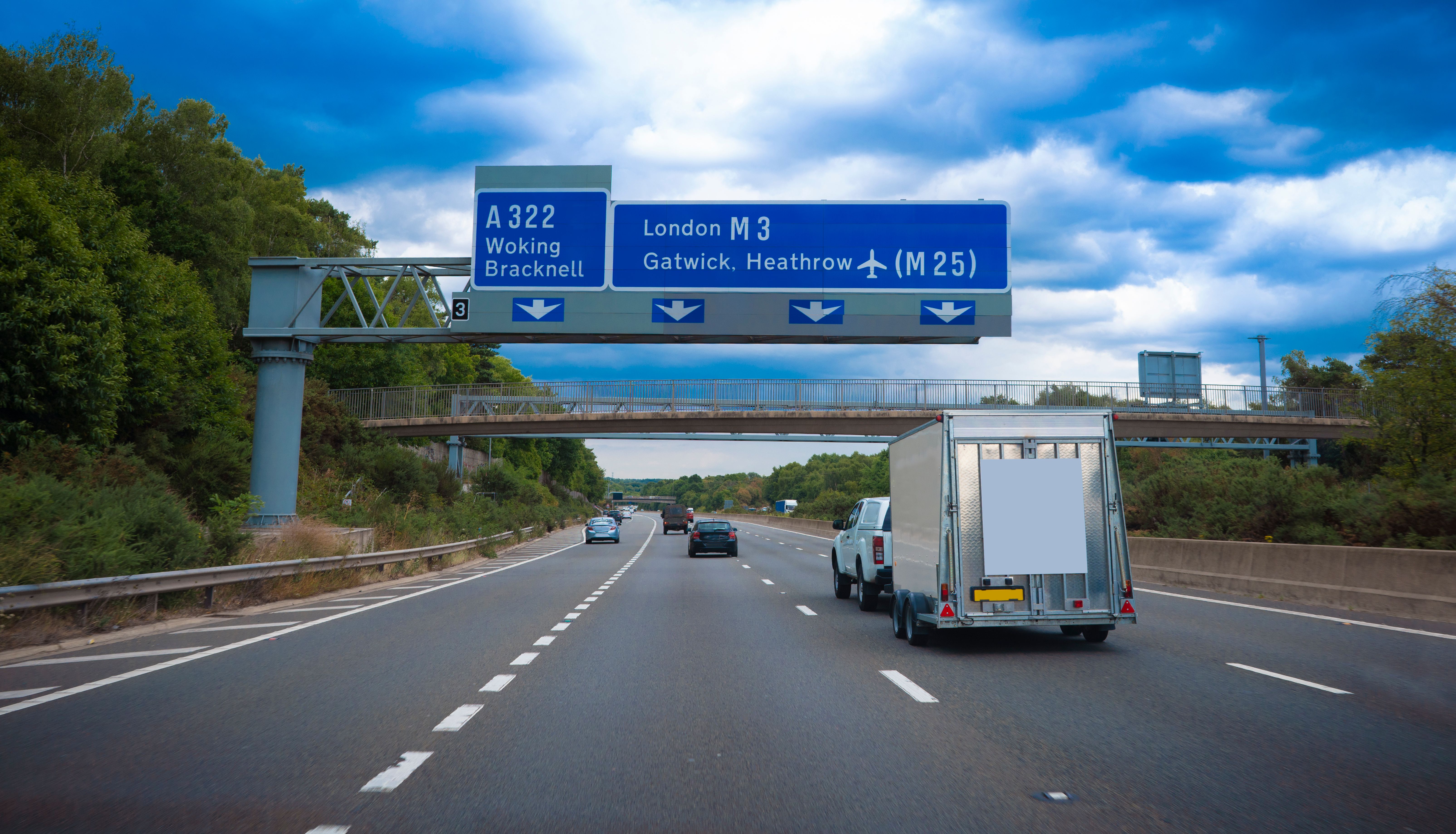 London M3 & M25 Motorway road signs to airports Gatwick and Heathrow in England UK