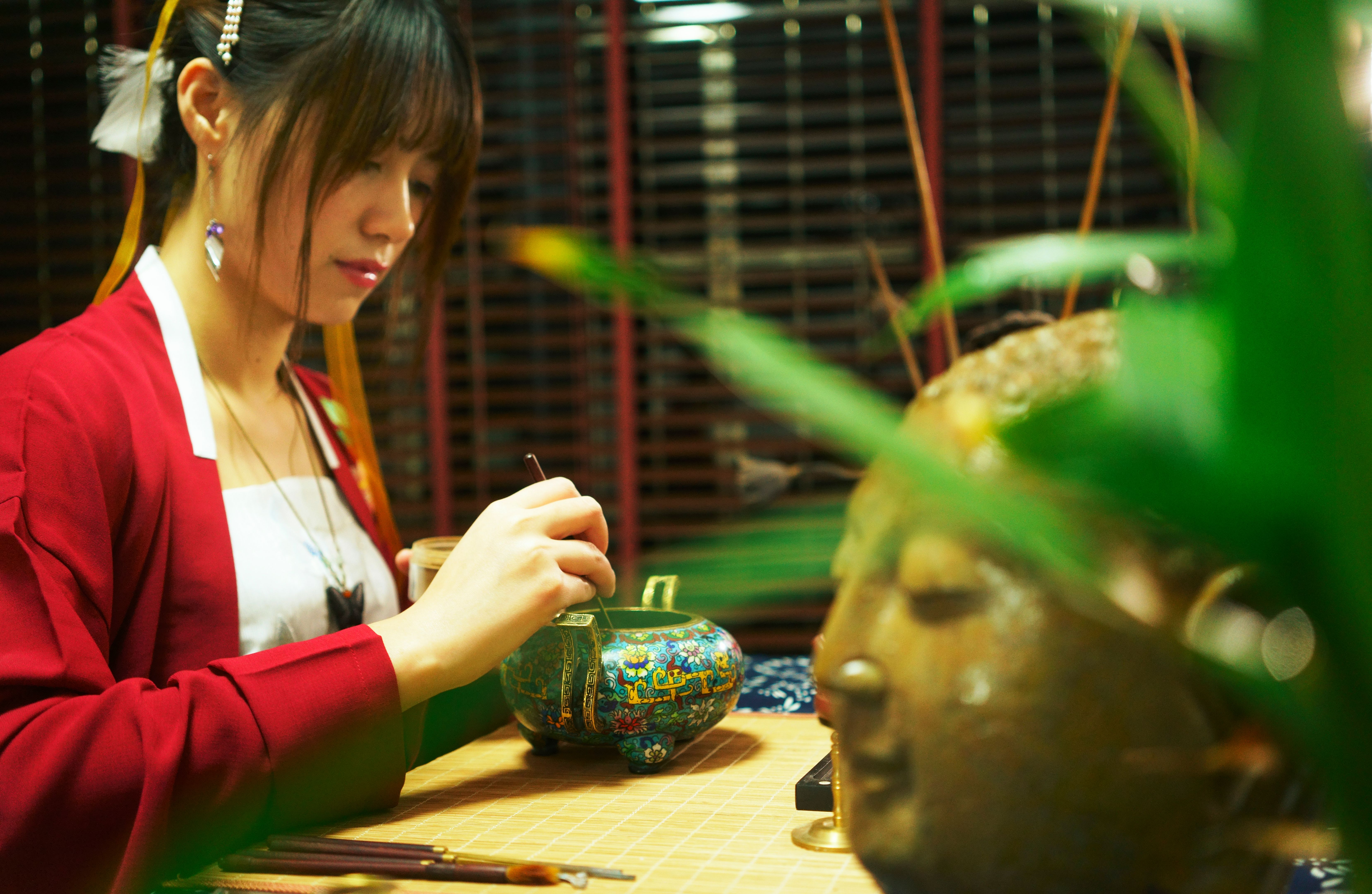 East women with incense