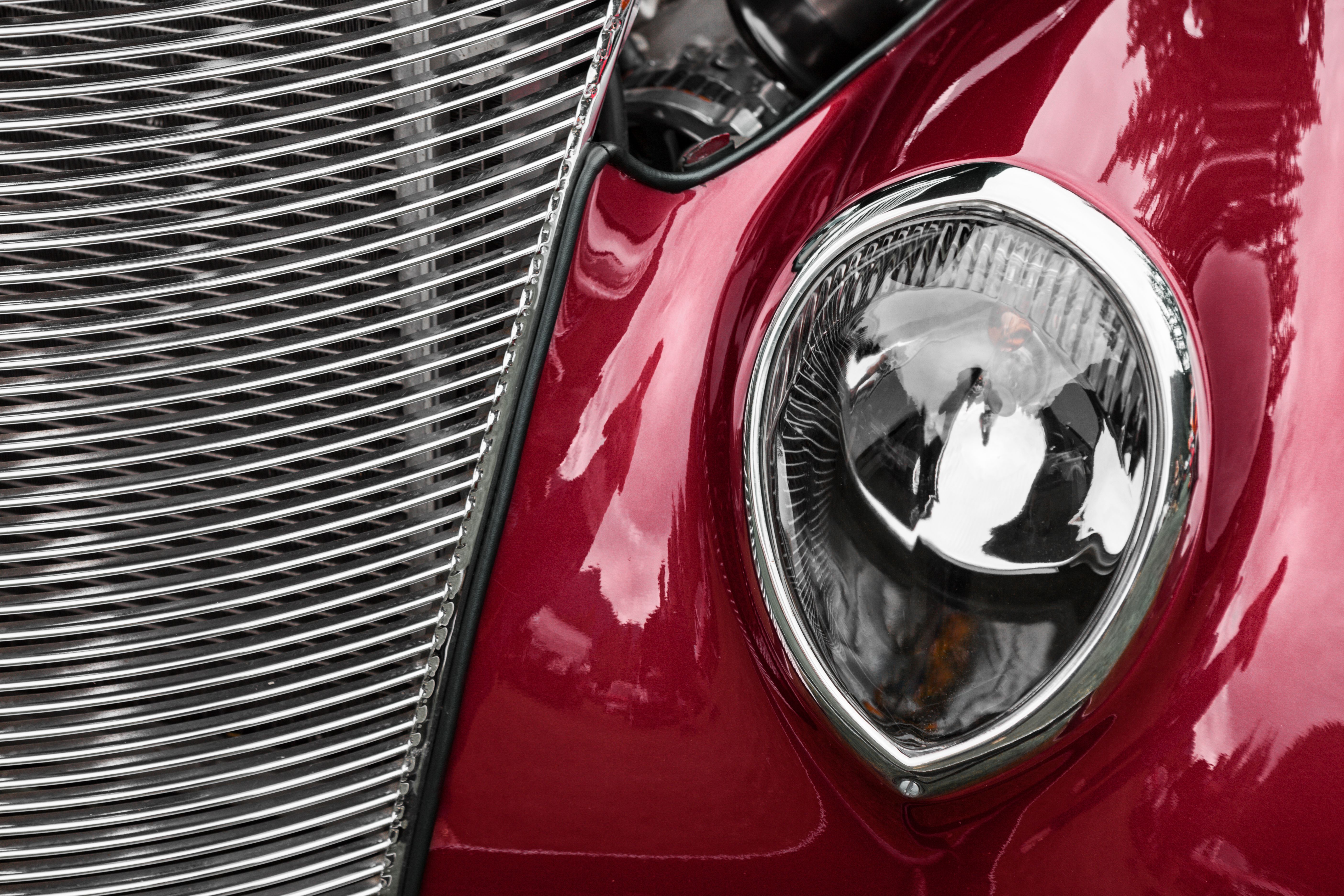 Close up of a 1937 Coupe Automobile Headlight and Grille