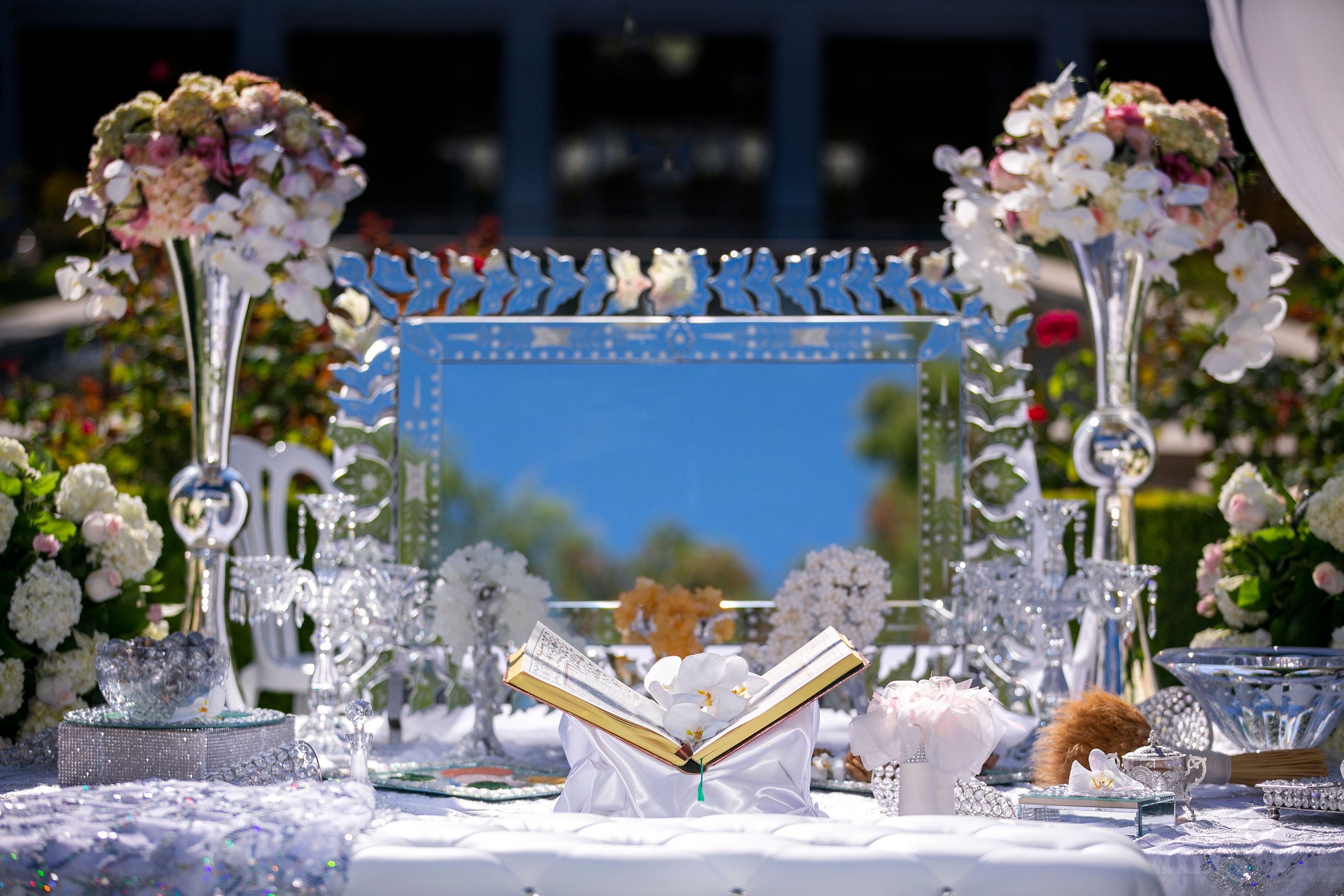 Persian wedding setting at an alter with the Book of Poetry and other decor Persian wedding setting at an alter with the Book of Poetry and other decor