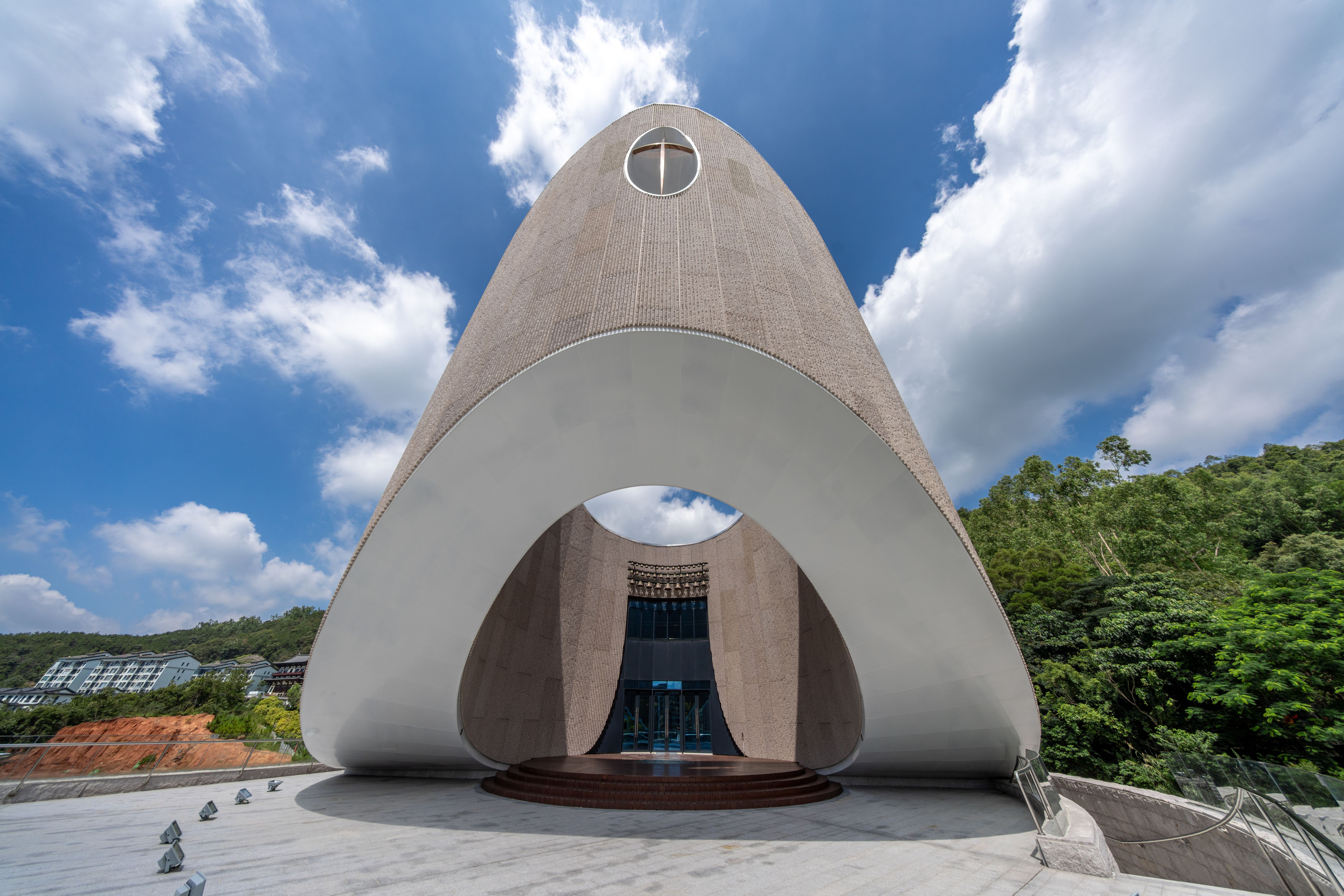 Church building with circular hole structure in the middle
