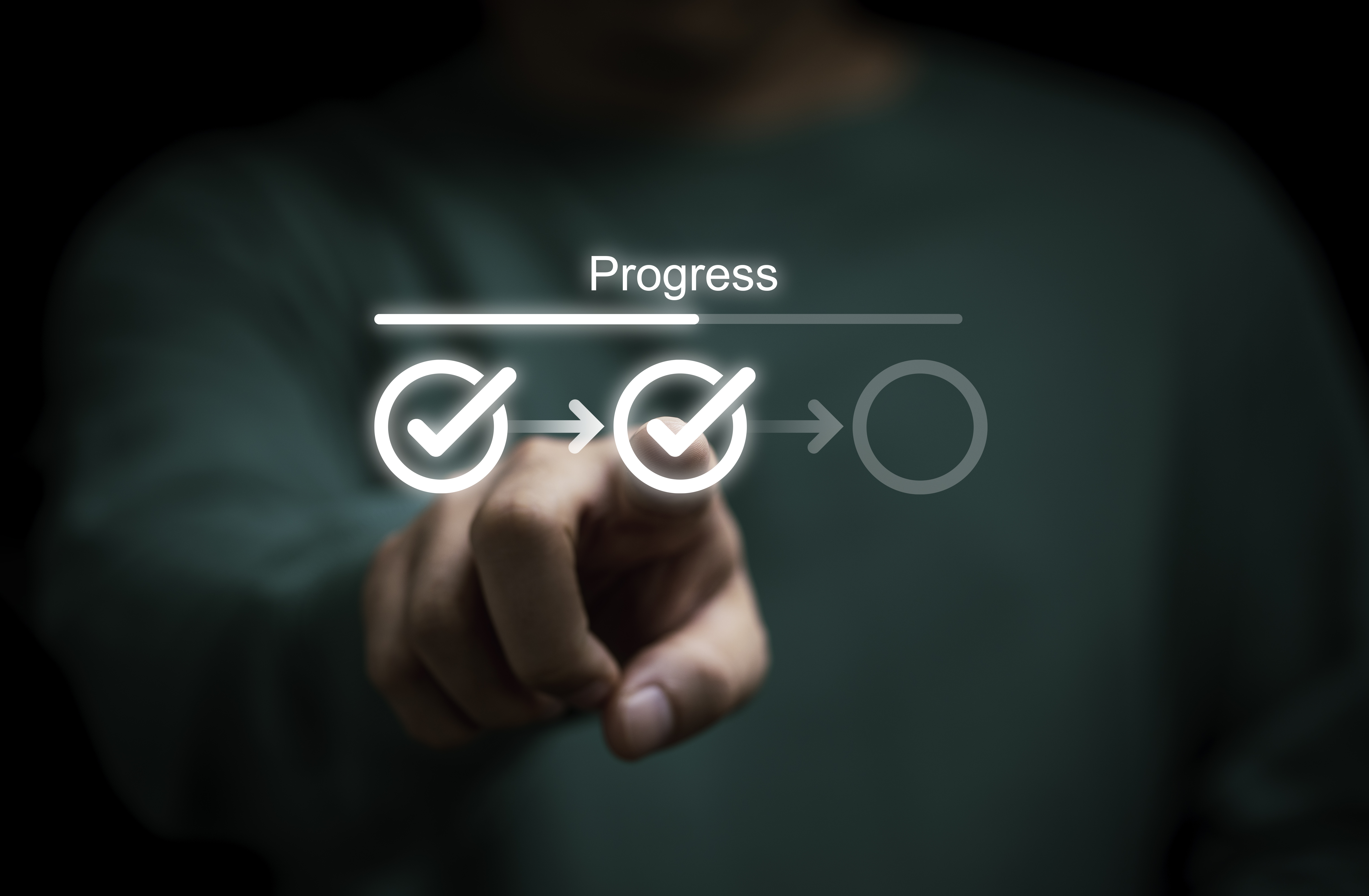 Businessman touching to tick correct mark in checklist with progressive loading status to remind work task progressive for project develop management and tracking concept. Businessman touching to tick correct mark in checklist with progressive loading status to remind work task progressive for project develop management and tracking concept.